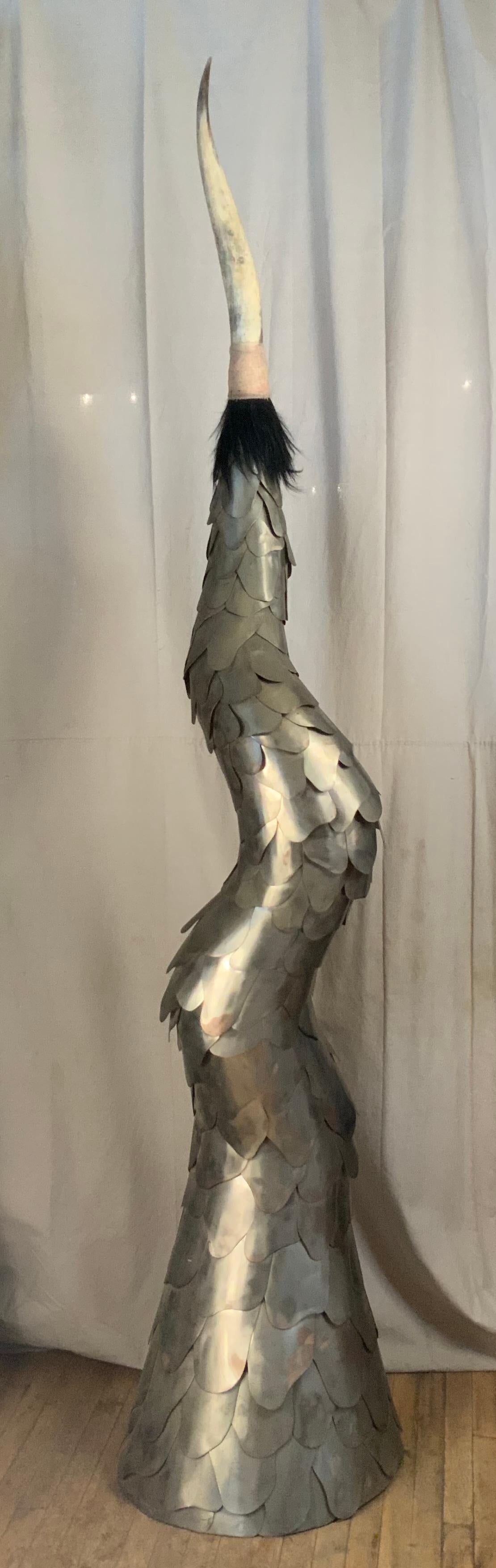 an incredible sculpture by artist Joseph Kurhajec, circa. 1972. From a series Kurhajec presented in the early 1970s, another piece from this series is in the collection of the Provincetown Art Association. 

The sculpture is a tapered and curving