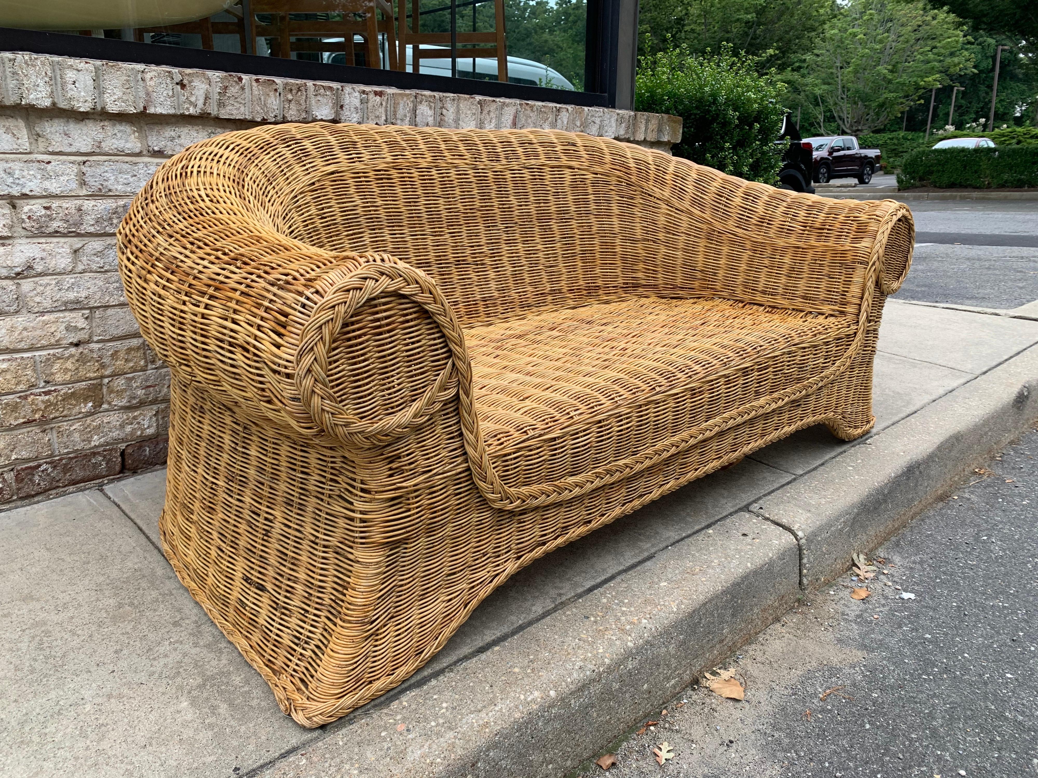 This wonderful piece is in fantastic condition, with a deep and wide seating space. Seat cushion included (as shown) but can be reupholstered if desired. 

Note: Interior dimensions 28 deep, 52 wide.