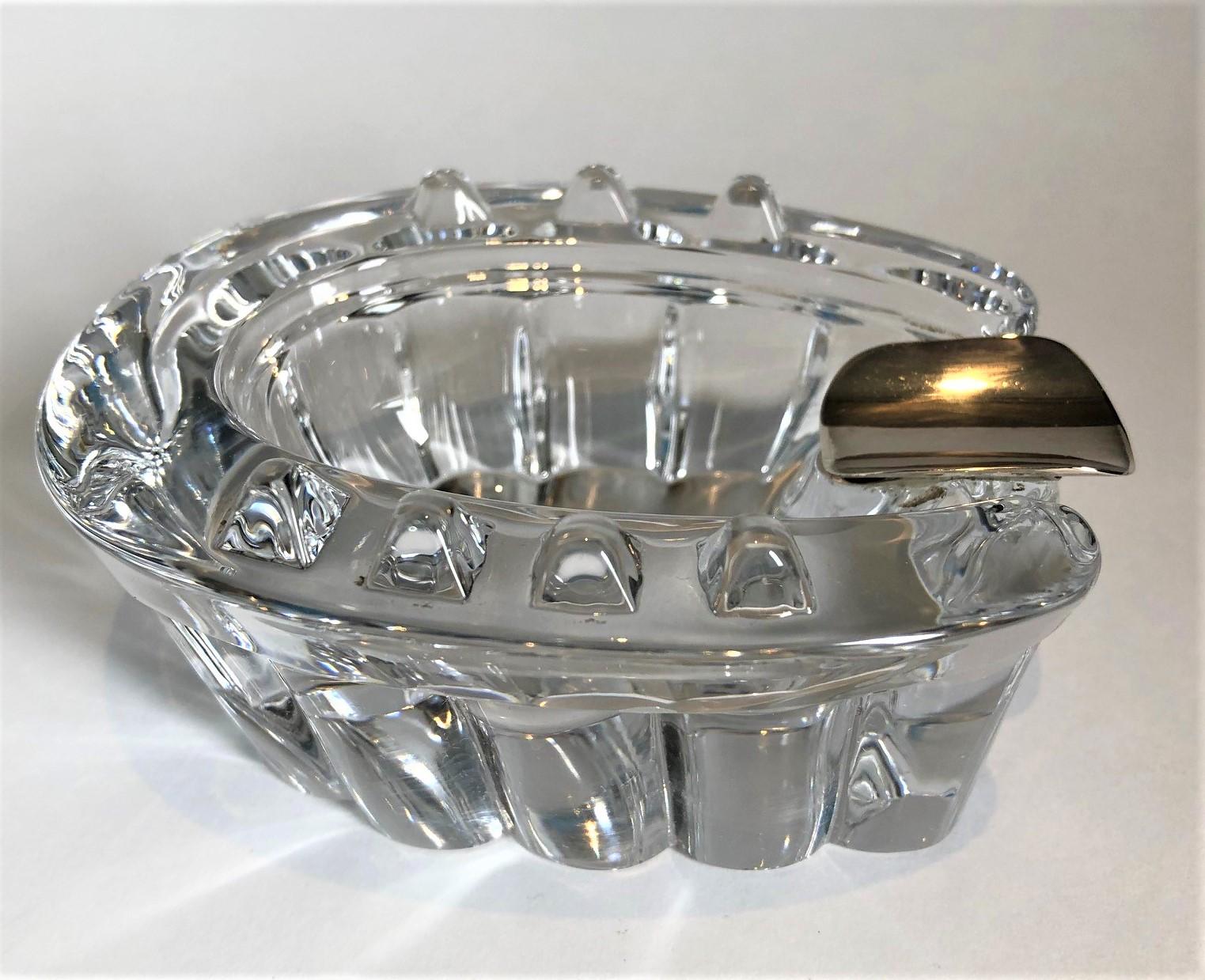 Fantastic cut crytal glass and silver horseshoe cigar / cigarette ashtray
Crystal & sterling silver lucky horseshoe ashtrays
Vintage 1930s clear crystal ashtray in the shape of a horse shoe.
Perfect gift for any equestrian / polo horses fan.