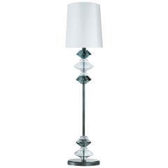 Fantastica lampada da terra con montatura in metallo color bronzo e paralume in tessuto color avorio