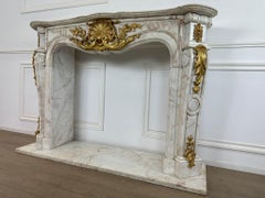 Fantastic, French marble rococo fireplace with bronze ormolu