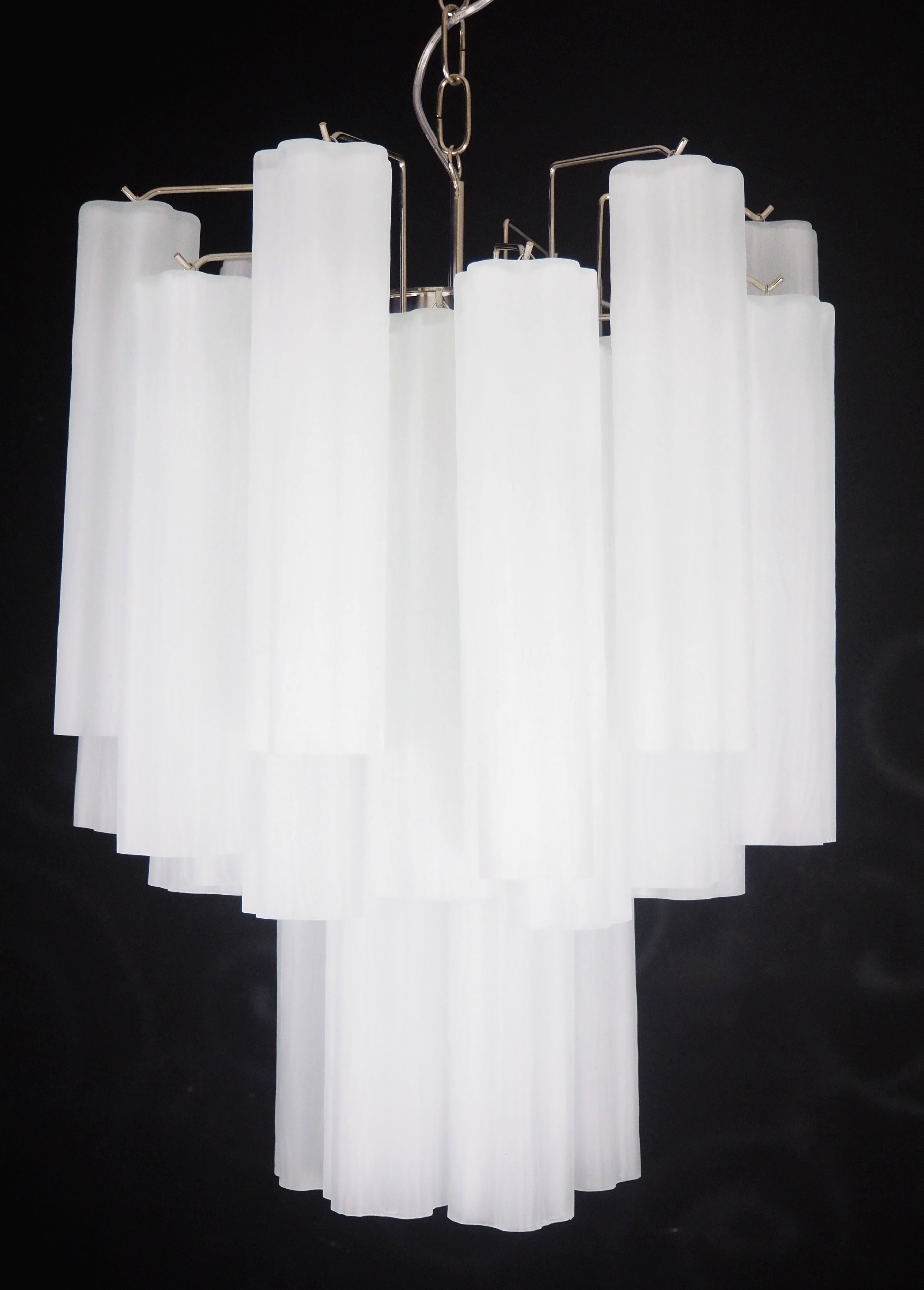 Italian vintage glass chandelier with albaster white glass tubes. The armor polished nickel ssupports 36 large etched glass tubes in a star shape.
Period: late XX century
Dimensions: 47,25 inches (120 cm) height with chain; 24,80 inches (63 cm)