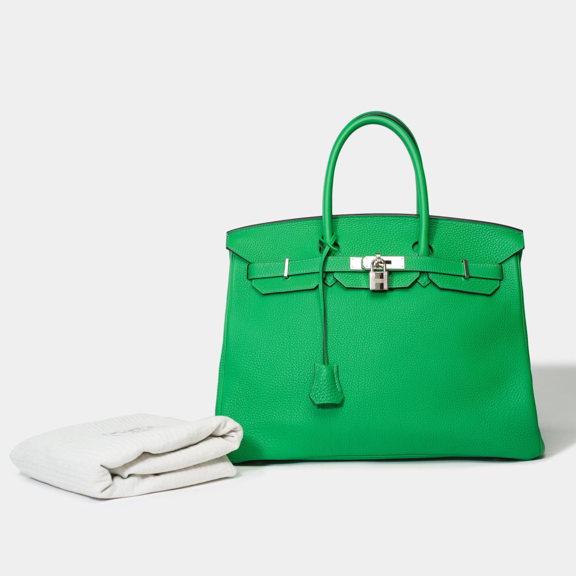Exquisite​ ​Hermès​ ​Birkin​ ​35​ ​in​ ​green​ ​Bamboo​ ​Togo​ ​leather​ ​,​ ​palladium​ ​silver​ ​metal​ ​trim​ ​,​ ​double​ ​handle​ ​in​ ​green​ ​leather​ ​allowing​ ​hand​ ​carry

Flap​ ​closure
Green​ ​leather​ ​inner​ ​lining​ ​​ ​,​ ​one​