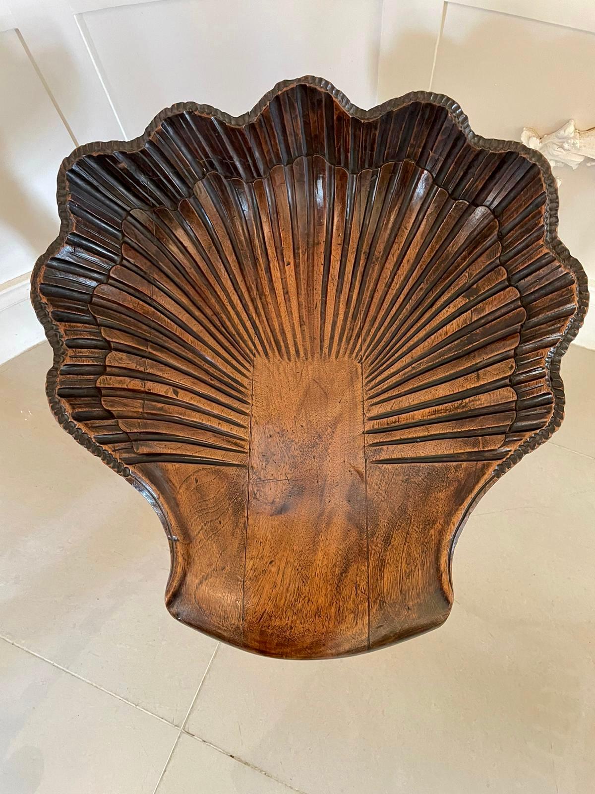 Fantastic Italian antique Victorian carved walnut Grotto revolving music stool having a fantastic quality carved solid walnut shell shaped revolving seat standing on carved solid walnut shaped cabriole legs with claw feet and raised on a shaped