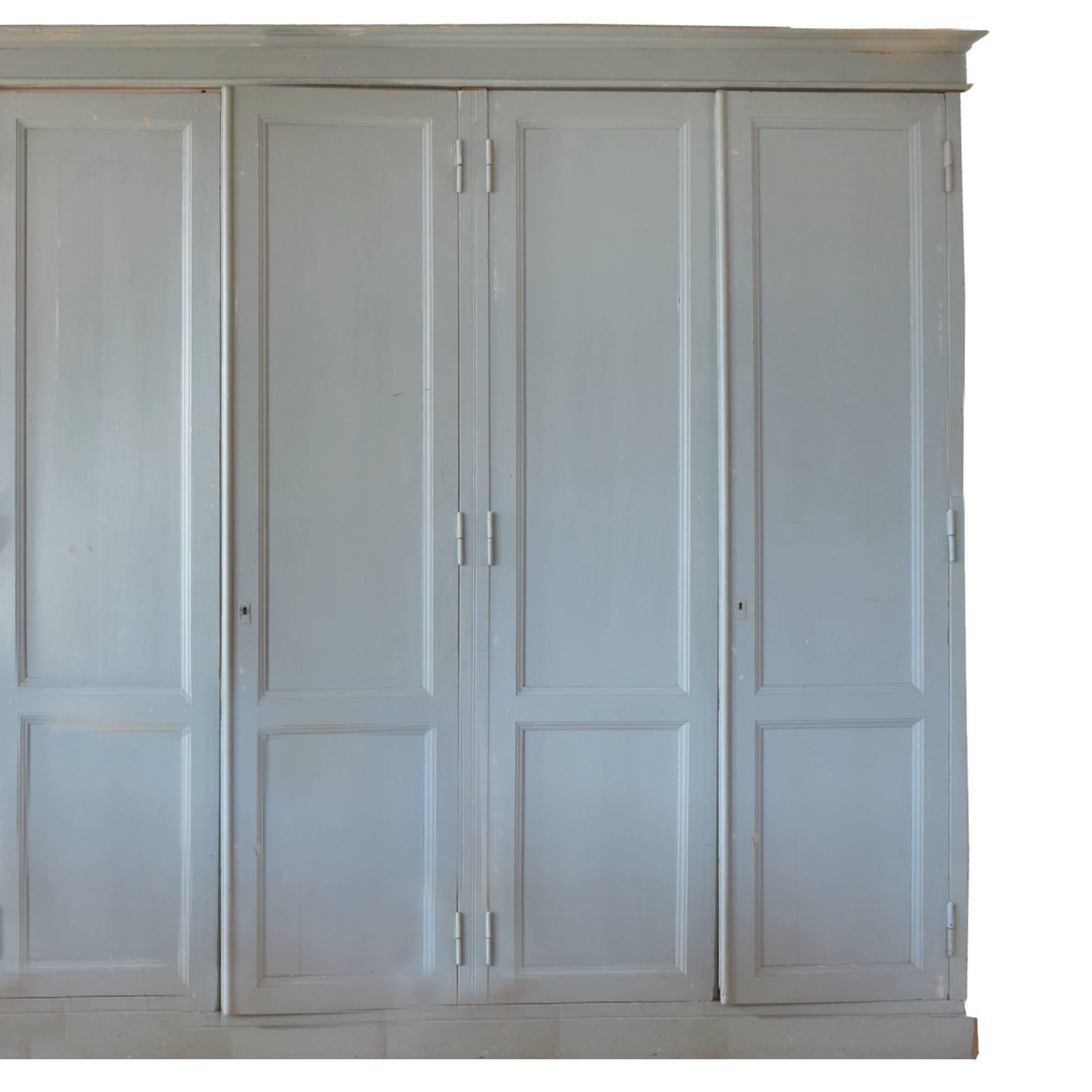 A fantastic large-scale Italian six-door cabinet with a lovely original blue-green paint, circa 1900.