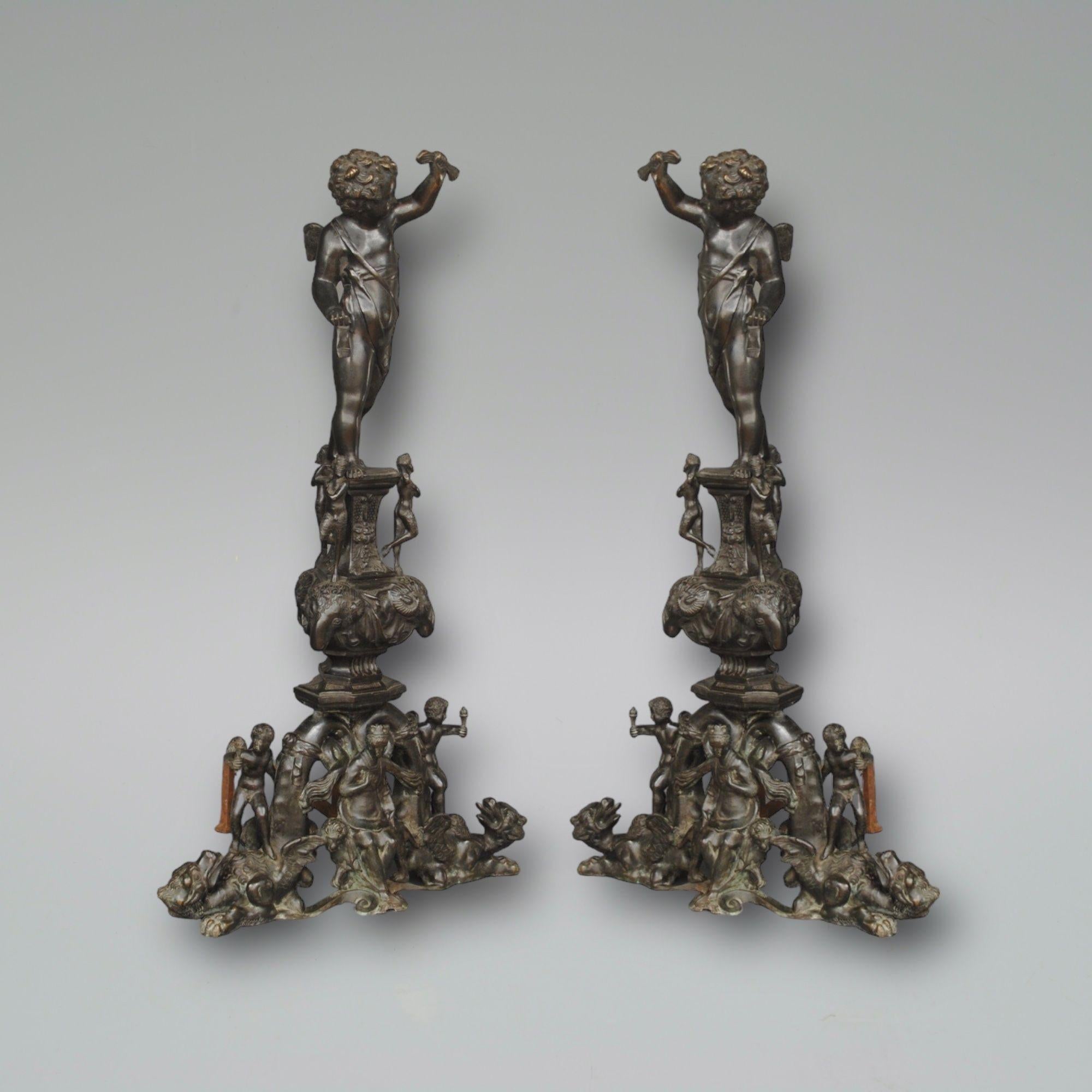 A large pair of 19th century renaissance style bronze andirons in the manner of Nicolo Roccatagla, mounted with cherubs and mystical figures.
These impressive andirons are after the designs of Roccatagla, many grace large country houses and this