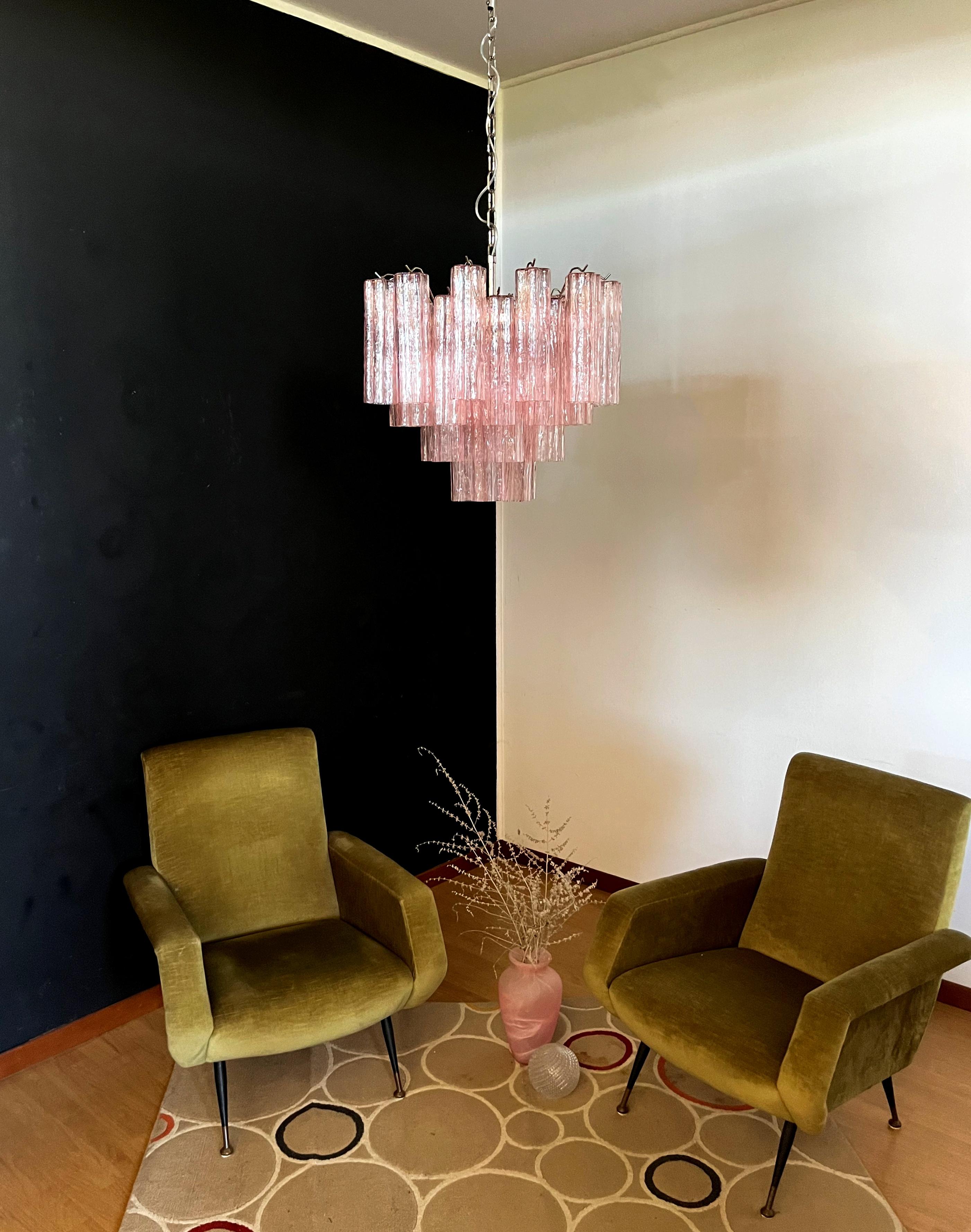 Italian vintage chandelier in Murano glass and nickel-plated metal structure. The armor polished nickel supports 36 large pink glass tubes in a star shape.
Period: late XX century
Dimensions: 	45,30 inches (115 cm) height with chain; 19,70 inches