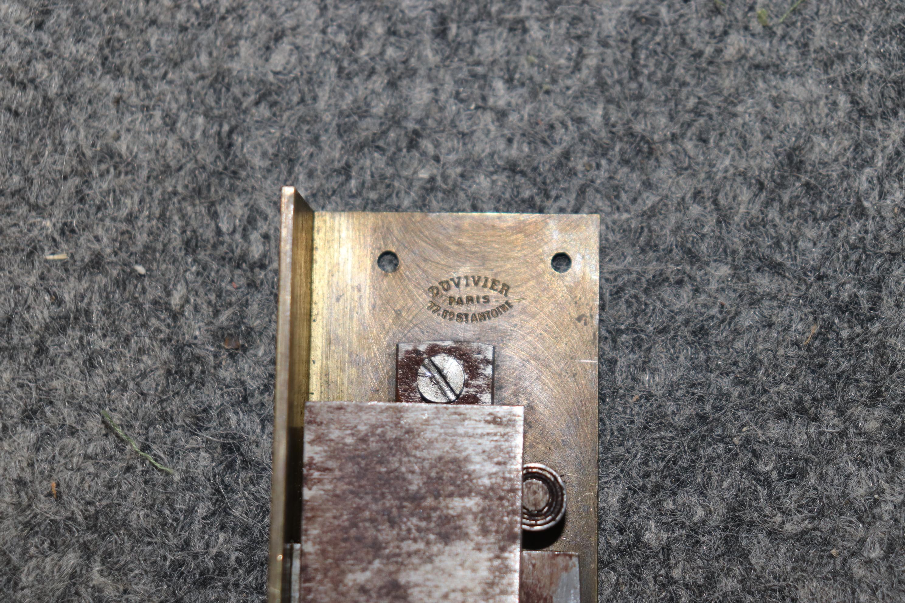 This is a fantastic, museum quality vitrine. This piece was painstakingly restored to it's origiinal glory and features a fantastic French-polished shellac finish; the best money can buy. The bronze has been professionally polished so the original