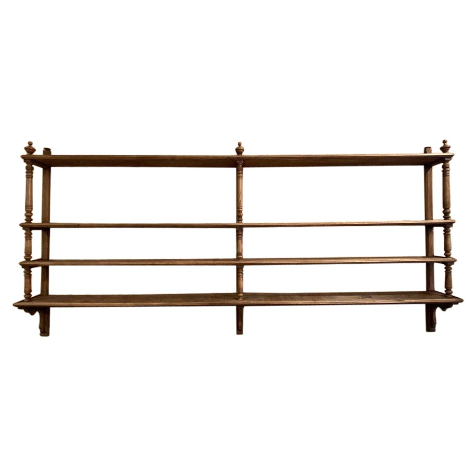 Authentic and wonderful old French oak bar counter and associated bottle rack. Originates from a small cosy family-run hotel,established back in 1925 in Reims in the beautiful Champagne district of northeastern France, for its bar restaurant.

The