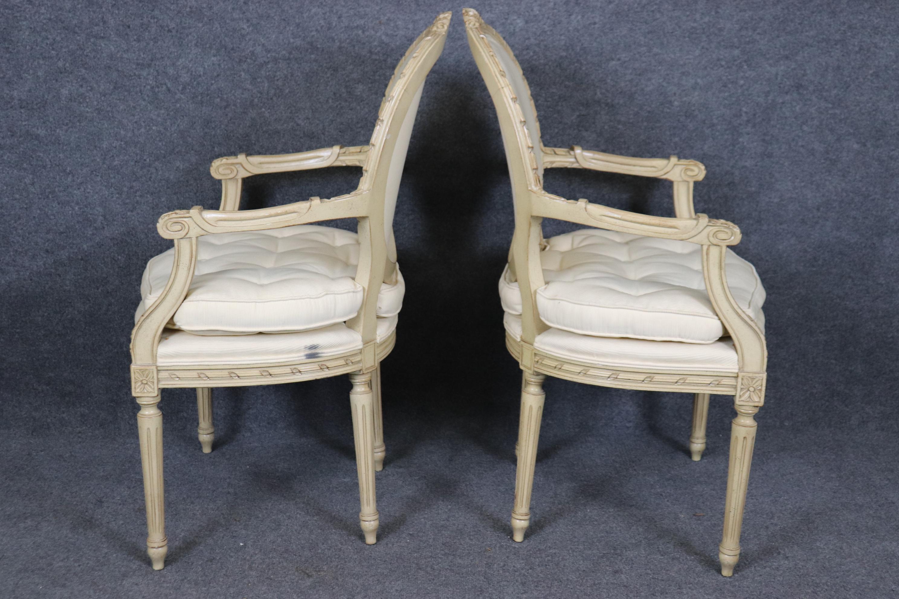 European Fantastic Pair Distressed Creme Painted Hand-Carved French Louis XVI Armchairs For Sale