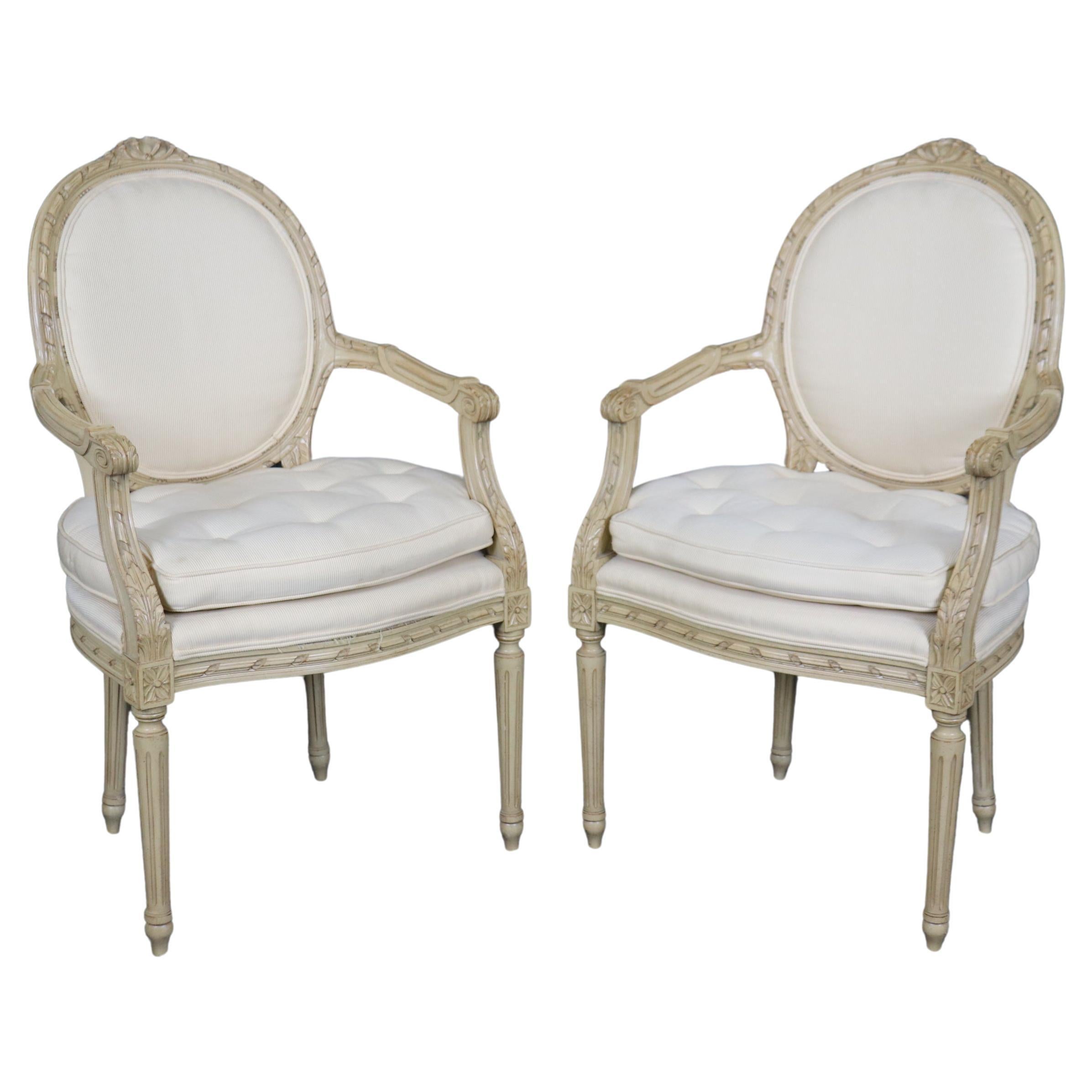 Fantastic Pair Distressed Creme Painted Hand-Carved French Louis XVI Armchairs For Sale