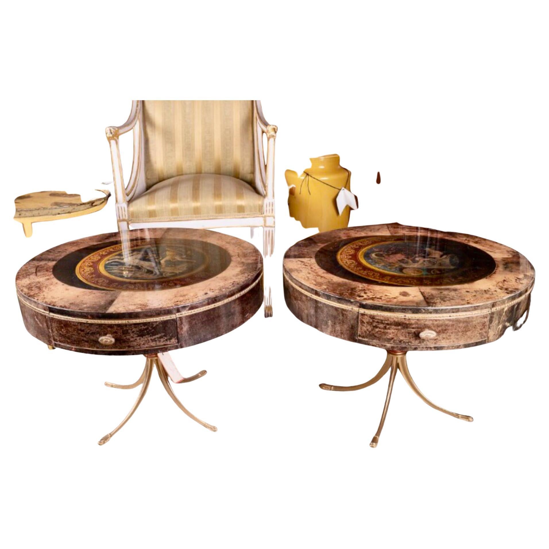 Having sold many pieces by Aldo Tura that were simply beautiful,these two tables are quite a departure from his work. The Neoclassical Paintings are an exceptional addition to the beauty of these tables!The artwork contains images of chariots,sea