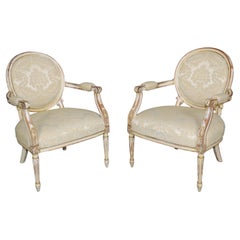 Fantastic Pair of Distressed Creme Painted Cameo Back French Louis XVI Armchairs