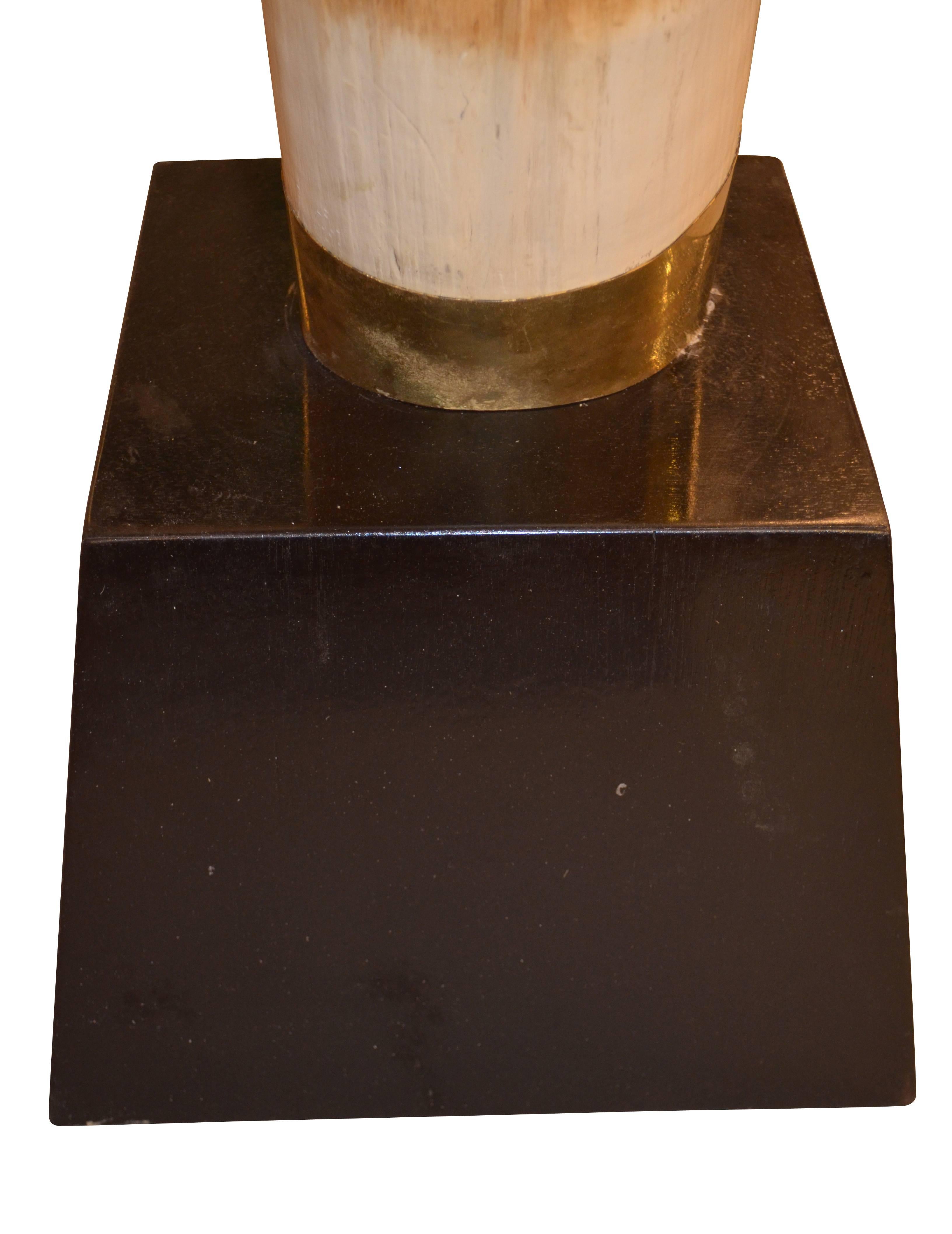 Pair of Faux Resin Elephant Tusks on Ebonized Bases For Sale 1