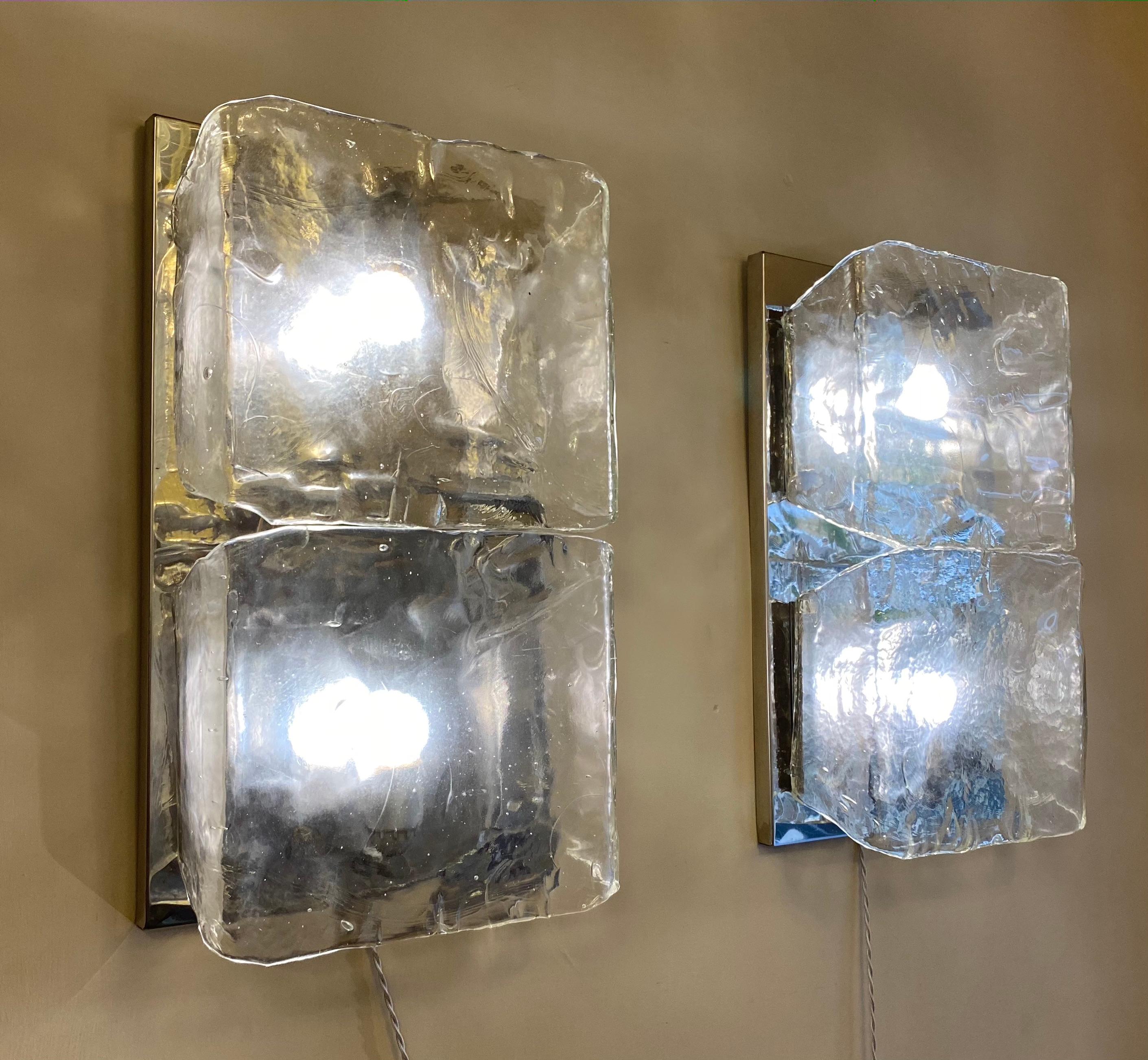 Pair of striking wall lights or sconces, each with two precious hand blown massive grey color Murano glass by Aureliano Toso Murano 1970'. Available 3 pairs and also a pair of chandeliers. 
 This model was published by Interni 1972.
 Price is for
