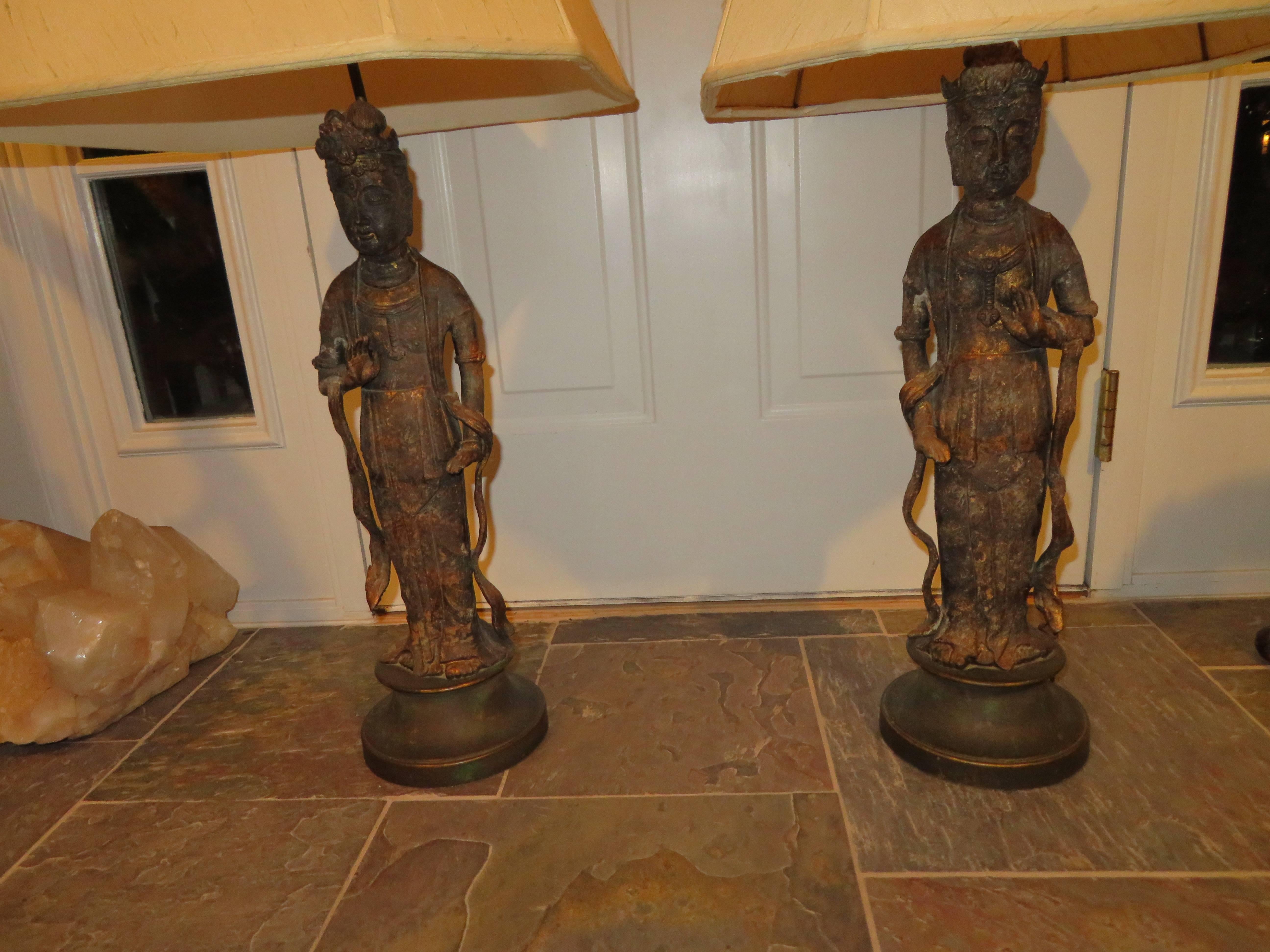 Fantastic pair of James Mont Style Asian figural Buddha Lamps. This pair has a wonderful aged patina and are in very nice vintage condition.