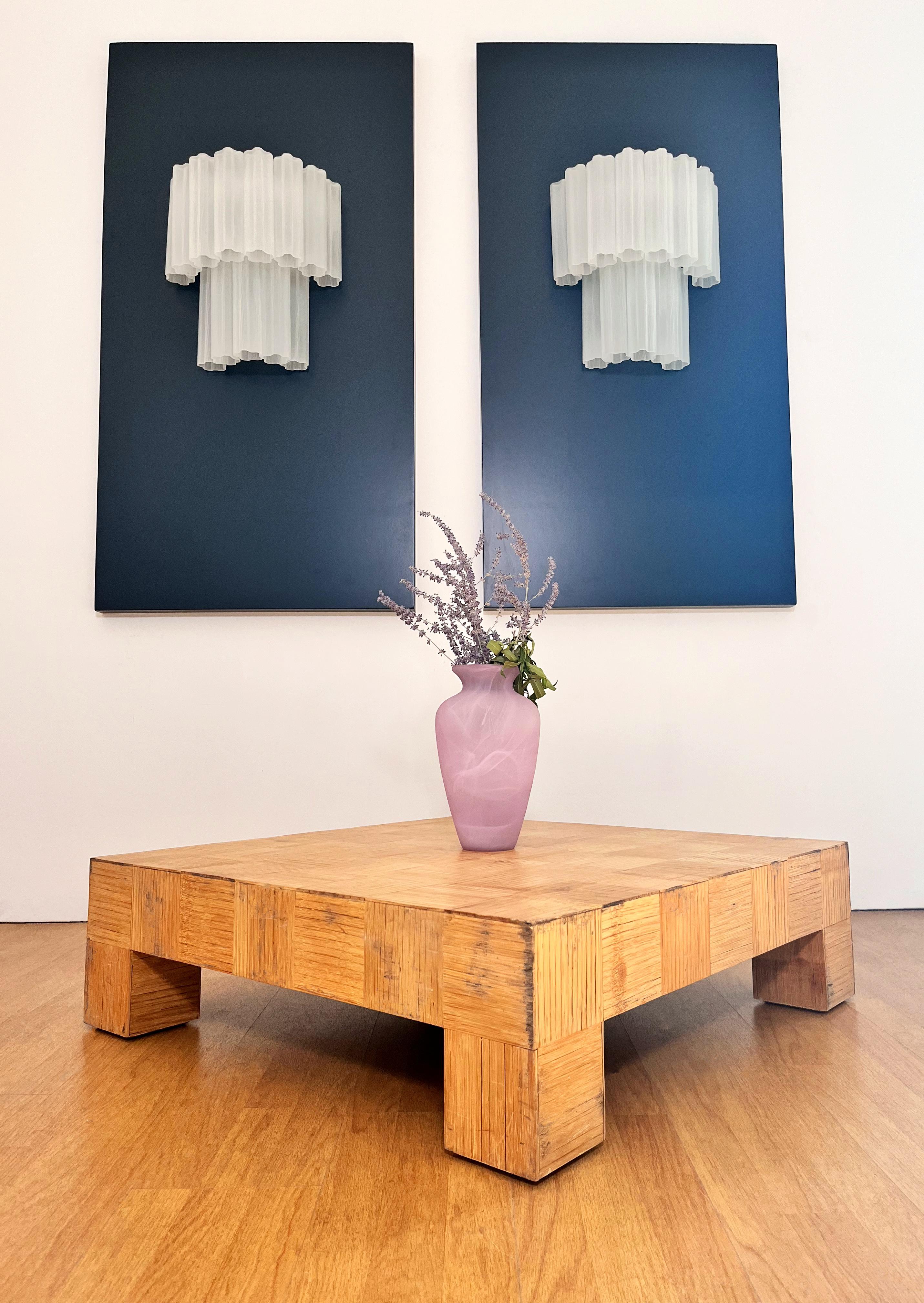 Italian vintage pair of wall sconces in Murano glass and nickel-plated metal structure. The armor polished nickel supports 13 large etched glass tubes in a star shape for each lamp.
Period:	late XX century
Dimensions: 18,60 inches height (48 cm); 17
