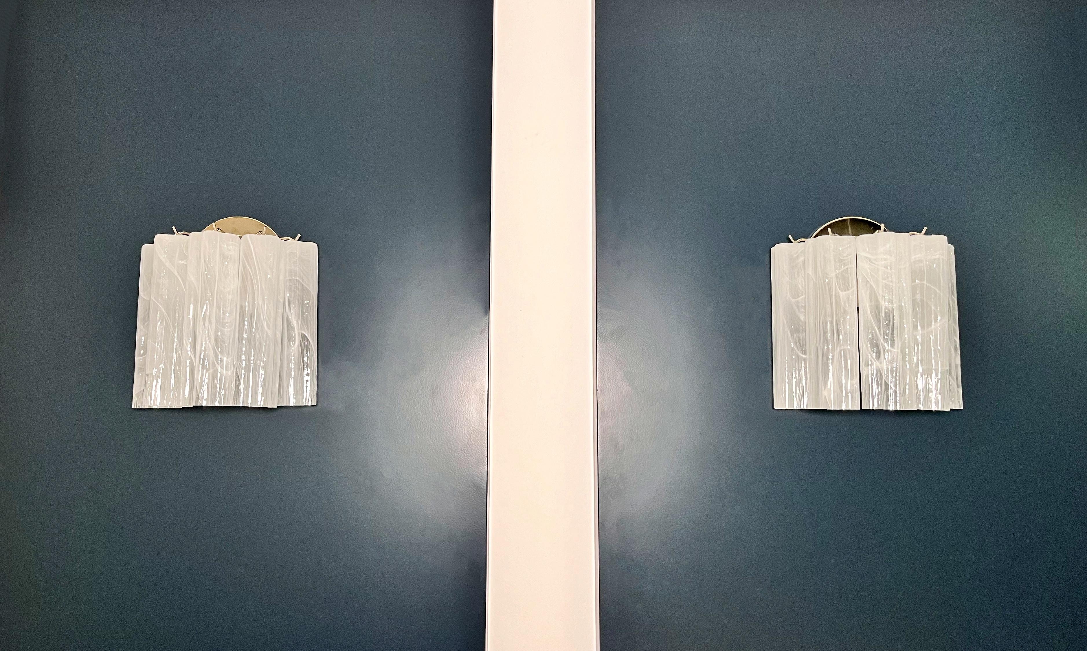 Italian vintage pair of wall sconces in Murano glass and nickel-plated metal structure. The armor polished nickel supports 5 large white albaster glass tubes in a star shape for each lamp. The alabaster technique created in Venetian glassworks gives