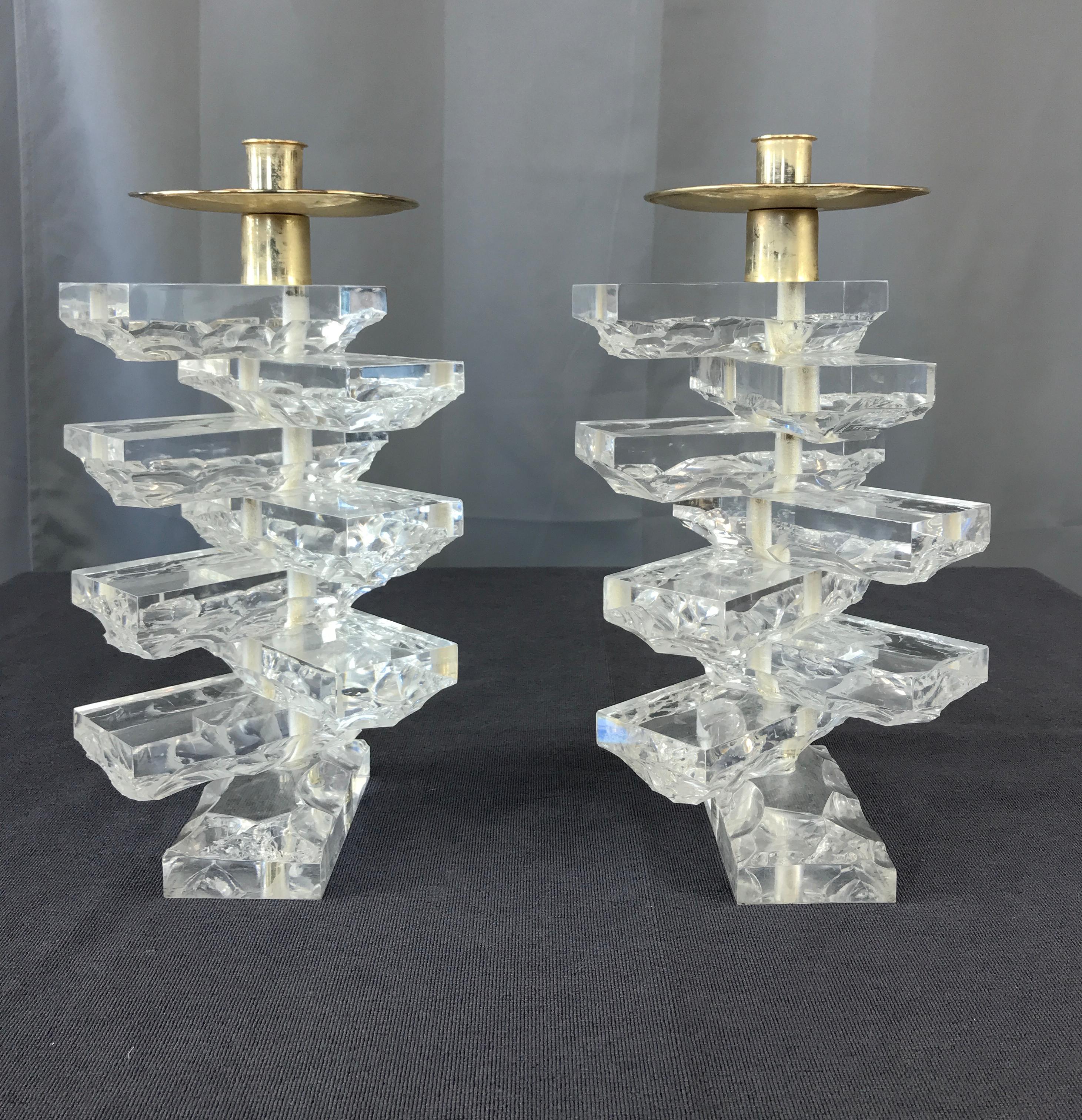 Fantastic pair of chunky and cut on one side Lucite block candleholders.
Eight rectangular blocks stacked one on top of the other ending with the holder.