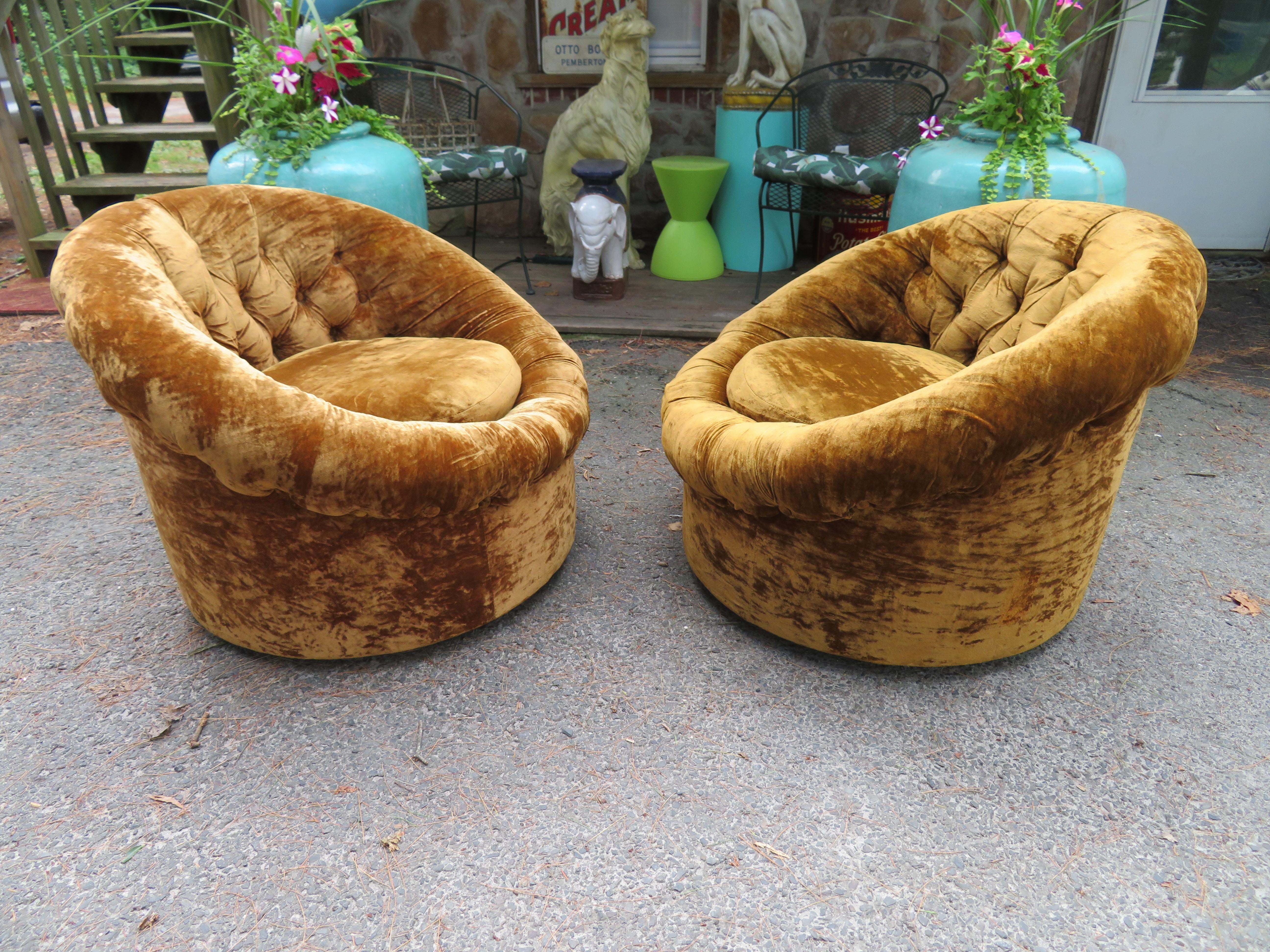 Fantastic pair of Pierre Paulin style tufted swivel pod chairs. This pair retains their original orange crushed velvet which is still presentable. We actually love the original fabric giving them authentic vintage appeal.