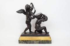 Fantastic Patinated and Gilt Bronze Figural Group of Cherubs Playing Drums