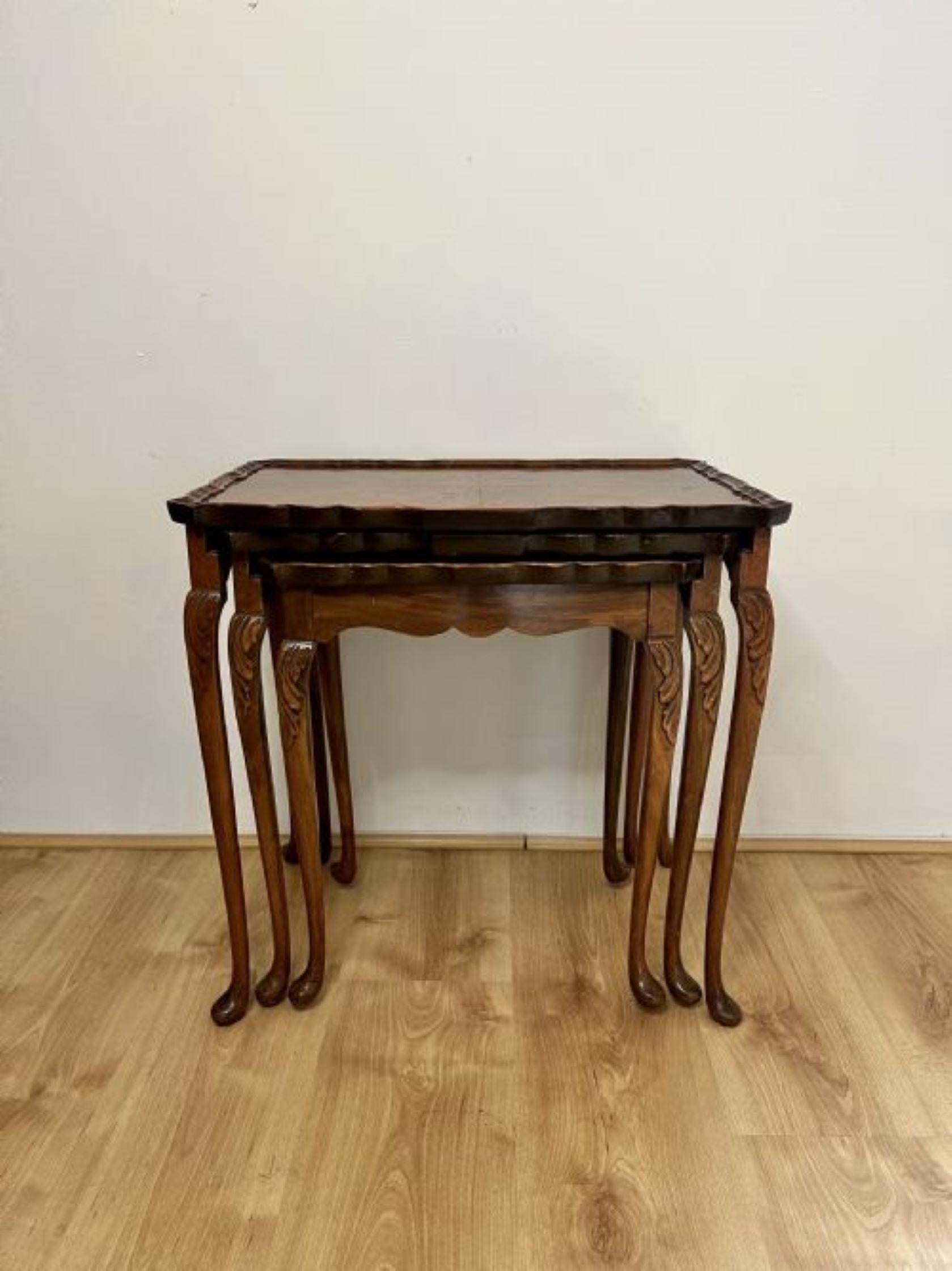 Fantastic quality antique burr walnut nest of tables having quality burr walnut serpentine shaped tops with a carved edge, standing on carved solid walnut shaped cabriole legs with carved scroll feet.