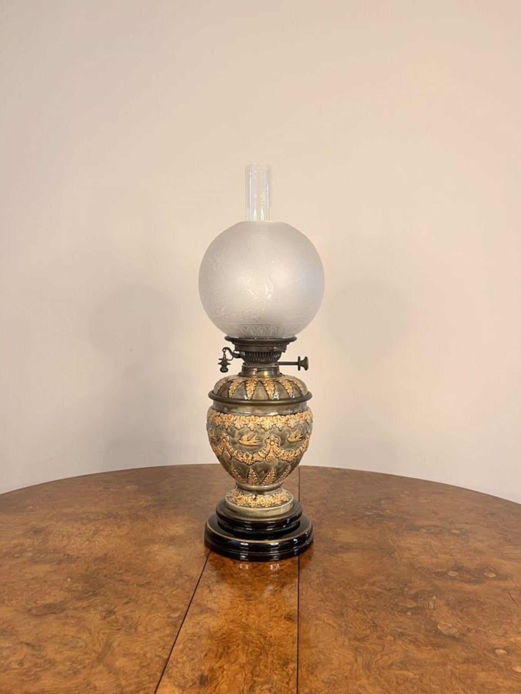 Fantastic quality antique Doulton Lambeth Victorian oil lamp having an etched glass shade and glass chimney, a double brass burner supported by a superb quality hand painted green and cream ceramic vase shaped column with beautiful birds, leaves,