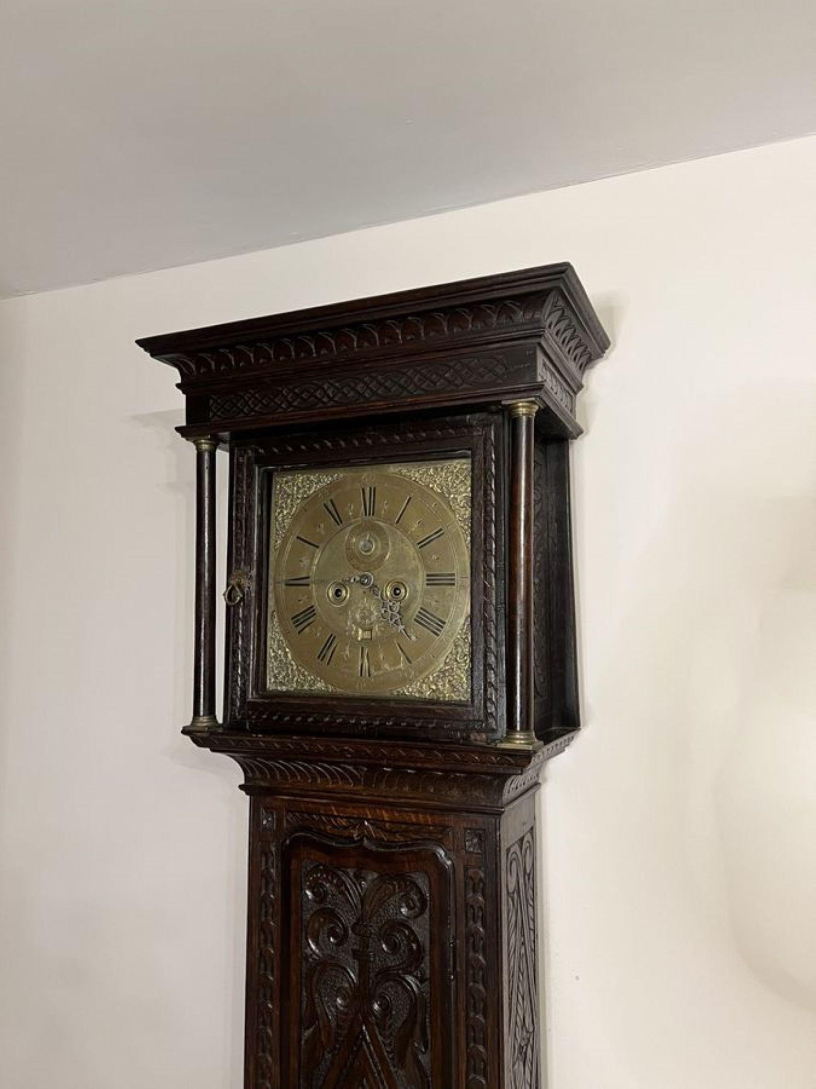 Fantastic quality antique George III carved oak long case clock, having an 8 day movement striking on a bell, with a brass dial the chapter ring inscribed Thomas Wentworth JNR, having a secondary minute hand and a calendar wheel with a fantastic