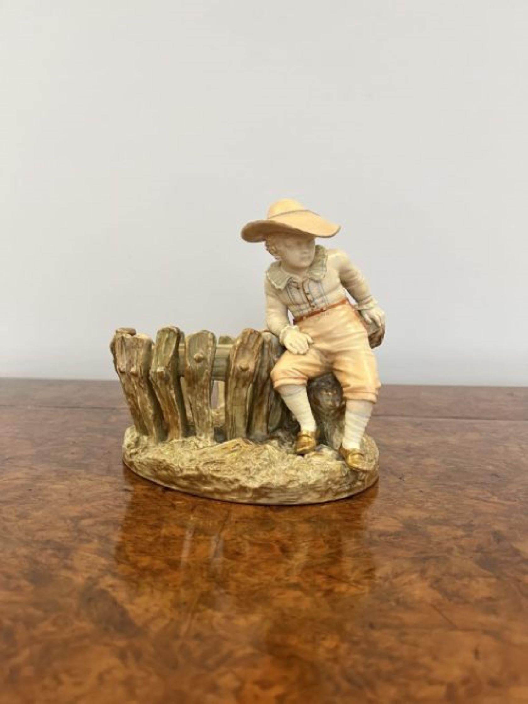 Fantastic quality antique Royal Worcester figure with a basket having a quality Royal Worcester figure with a basket having a male in wonderful period clothing clothing in red, white, blue and gold colours with a basket to the side of him standing
