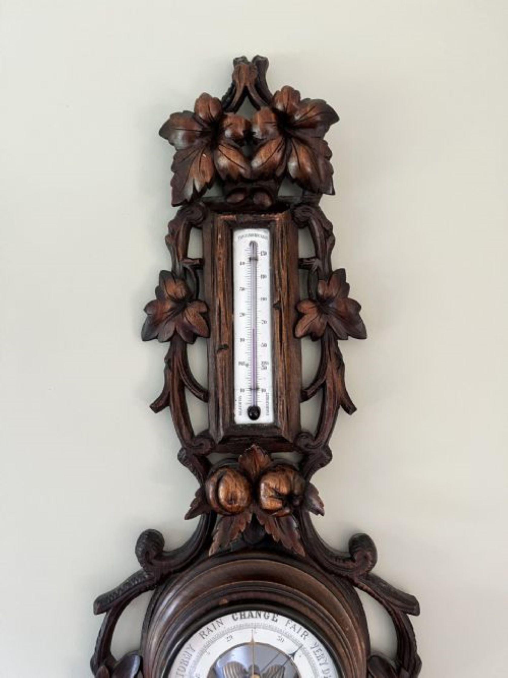 Fantastic quality antique Victorian Black Forest aneroid barometer having a fantastic quality antique Victorian Black Forest barometer with a quality carved walnut case with leaves, branches and berries surrounding the barometer with a circular