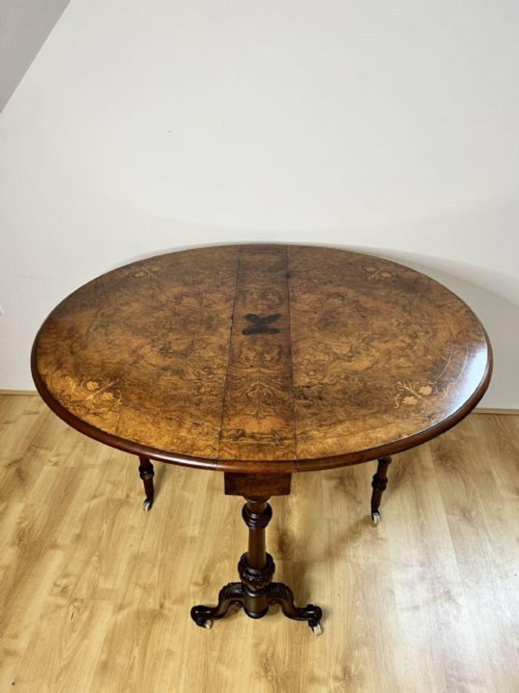 Fantastic quality antique Victorian burr walnut inlaid Sutherland table having a fantastic quality  burr walnut dropside gateleg table with inlaid flowers and stringing to top, quality stretcher to base, on the original castors.

Dimensions open
W