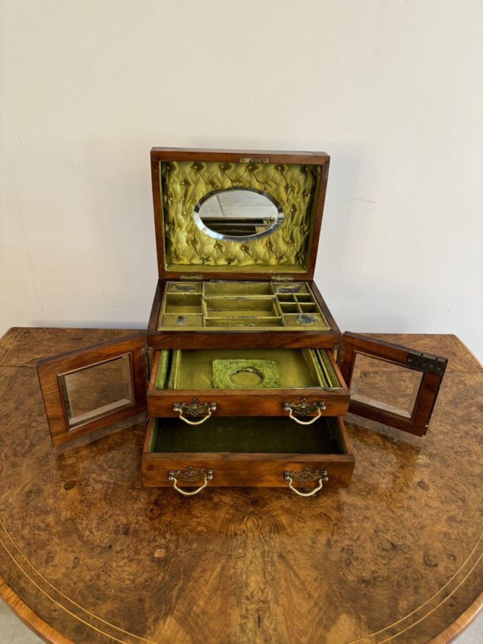 Fantastic quality antique Victorian burr walnut jewellery box, having a quality burr walnut jewellery box with the original brass swing handle to the top and an engraved ship, having a pair of glazed doors to the front opening to reveal reveal a