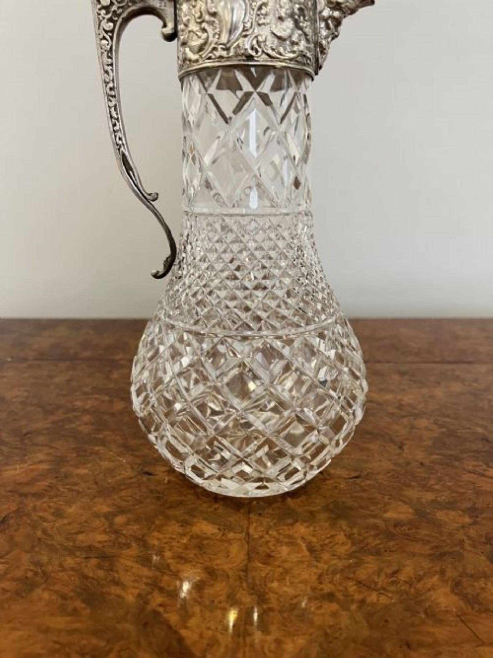 Fantastic quality antique Victorian cut glass and silver plated claret jug having a fantastic quality antique Victorian claret jug having a wonderful cut glass circular body with a ornate silver plated shaped handle and spout with fantastic ornate