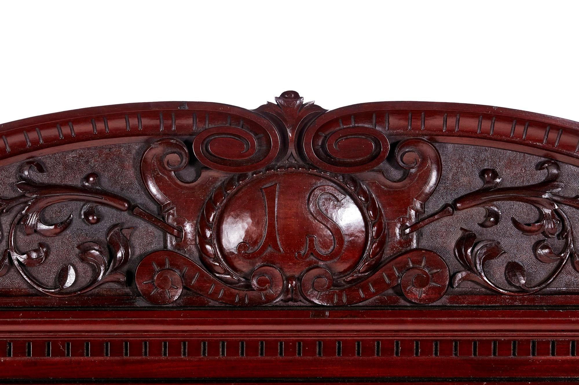 Fantastic quality antique Victorian mahogany large carved wall mirror, fantastic carved pediment supported by 2 reeded Corinthian columns, large bevel edged mirror with fantastic quality carved supports.
Fantastic color and condition.
Measures: