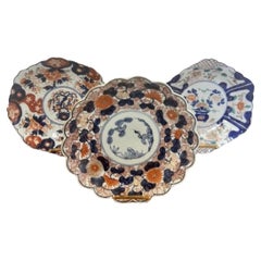 Fantastic quality collection of three Japanese scalloped shaped imari plates
