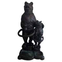 Fantastic quality large antique Black Forest carved bear double stick stand