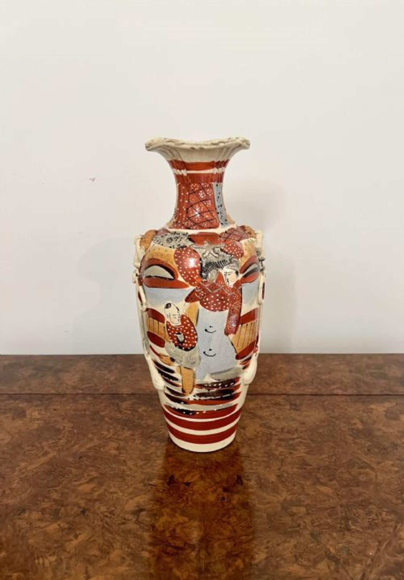 Fantastic quality large antique Satsuma vase having a large antique Satsuma vase decorated with traditional figures and patterns in vibrant red, blue, white and brown colours with a fluted shaped neck raised on a circular base.