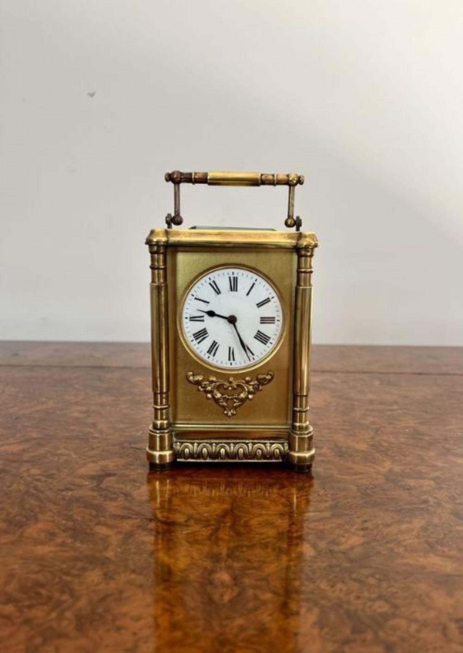 Fantastic quality large antique Victorian quality ornate brass carriage clock having a quality eight day French movement in an ornate brass case with turned columns to the corners, white porcelain dial with brass ornate detail underneath.
Please
