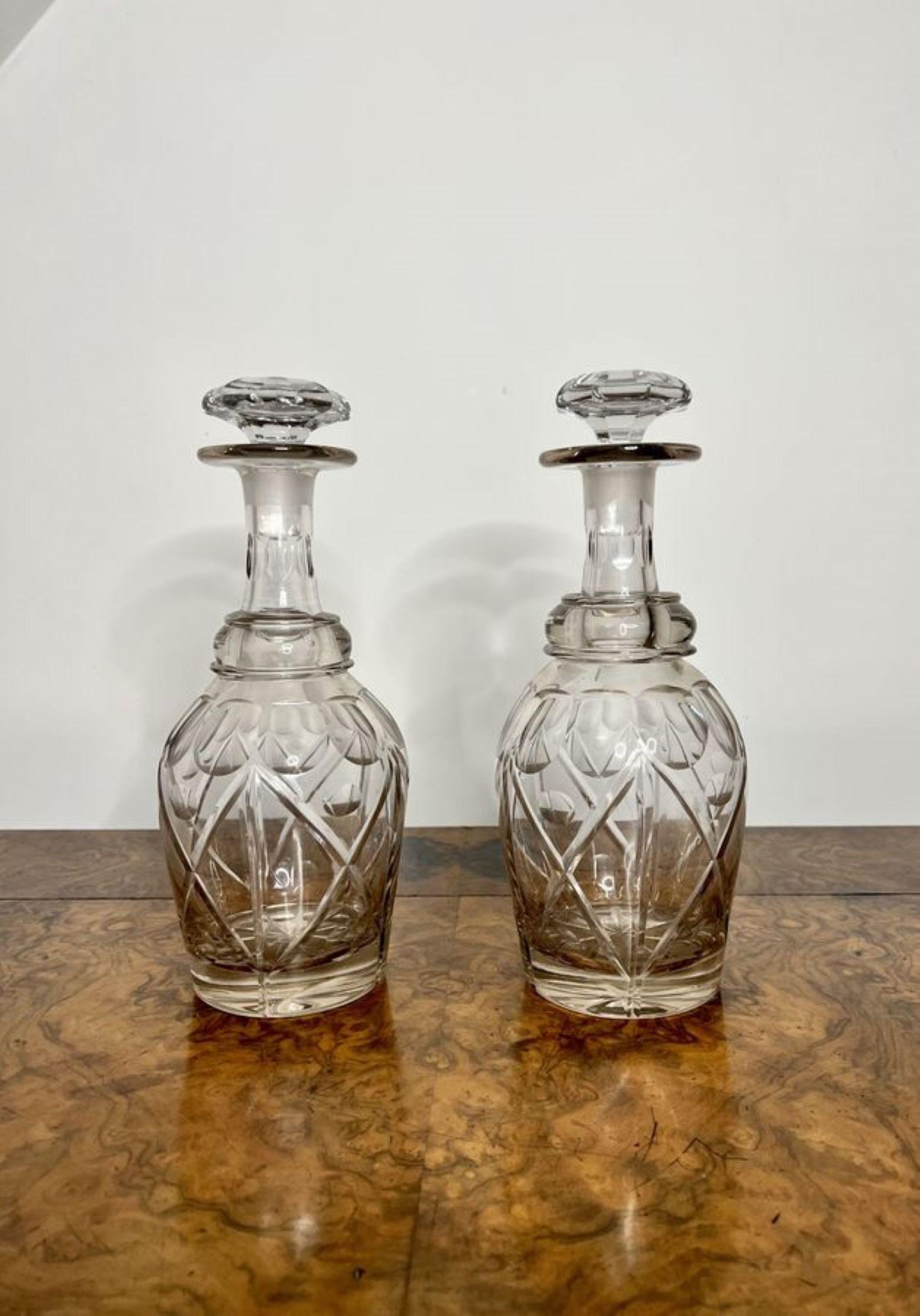 Fantastic quality pair of antique Victorian decanters having a fantastic pair of quality cut glass decanters with the original cut glass stoppers.

D. 1880