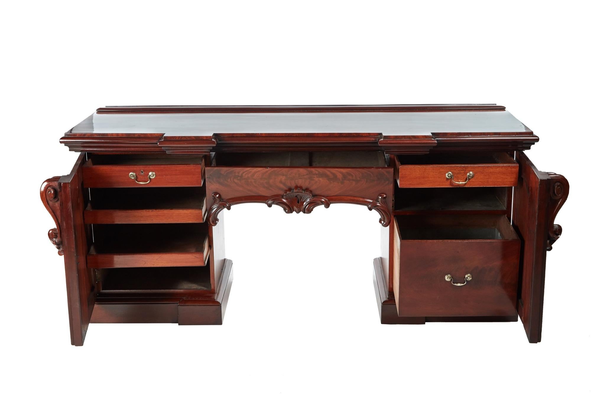 
Fantastic quality antique Victorian antique carved mahogany sideboard with a fantastic quality mahogany top, one carved centre drawer supported by two pedestals with carved doors and a fitted interior. It stands on a plinth base.

A magnificent