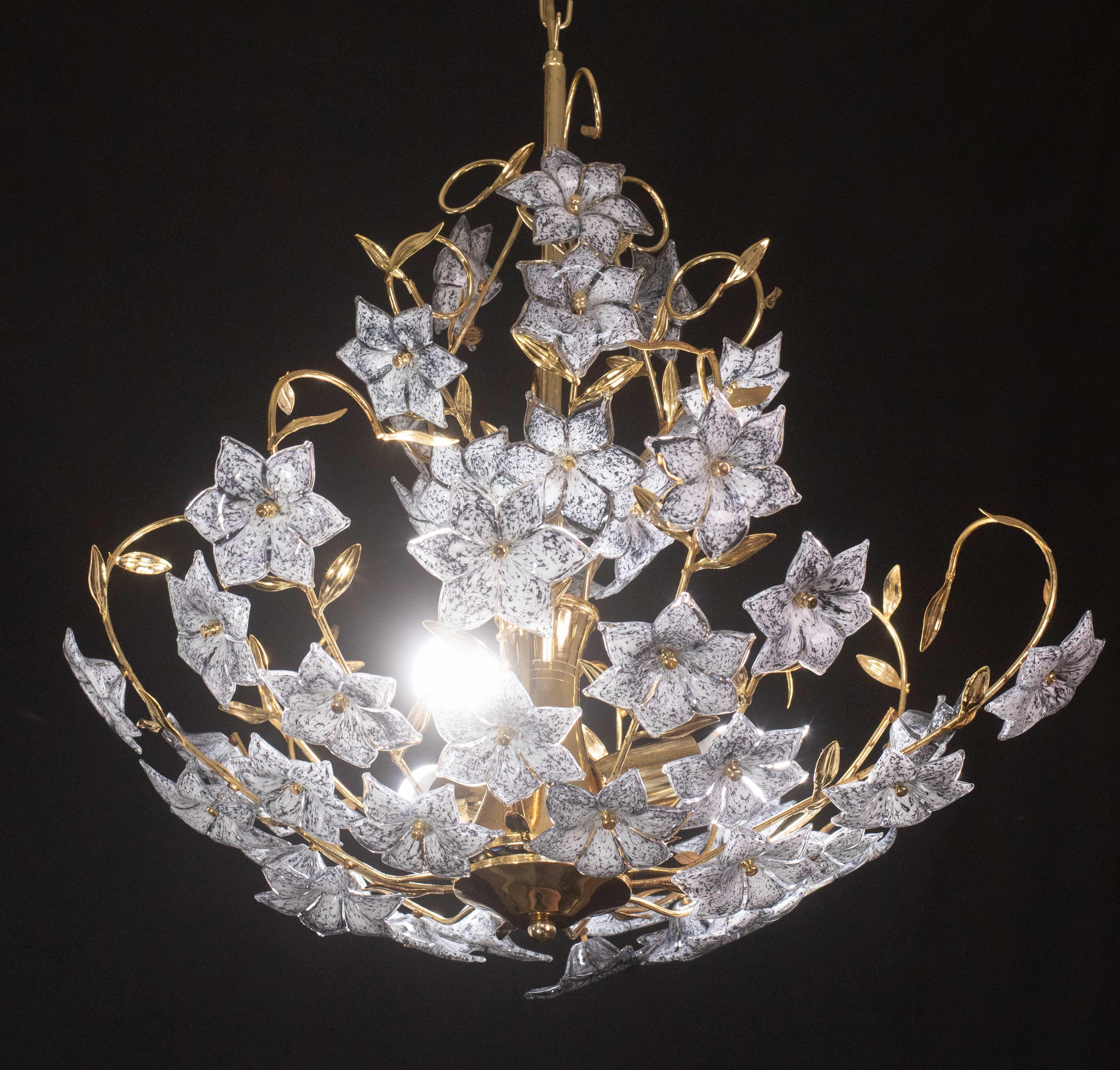 Spectacular Vintage Murano glass chandelier full of black flowers.
The chandelier has 3 light points with E27 connection, possible to rewire for USa.
The structure is in gold bath, some signs of time on the structure, not visible when mounted with