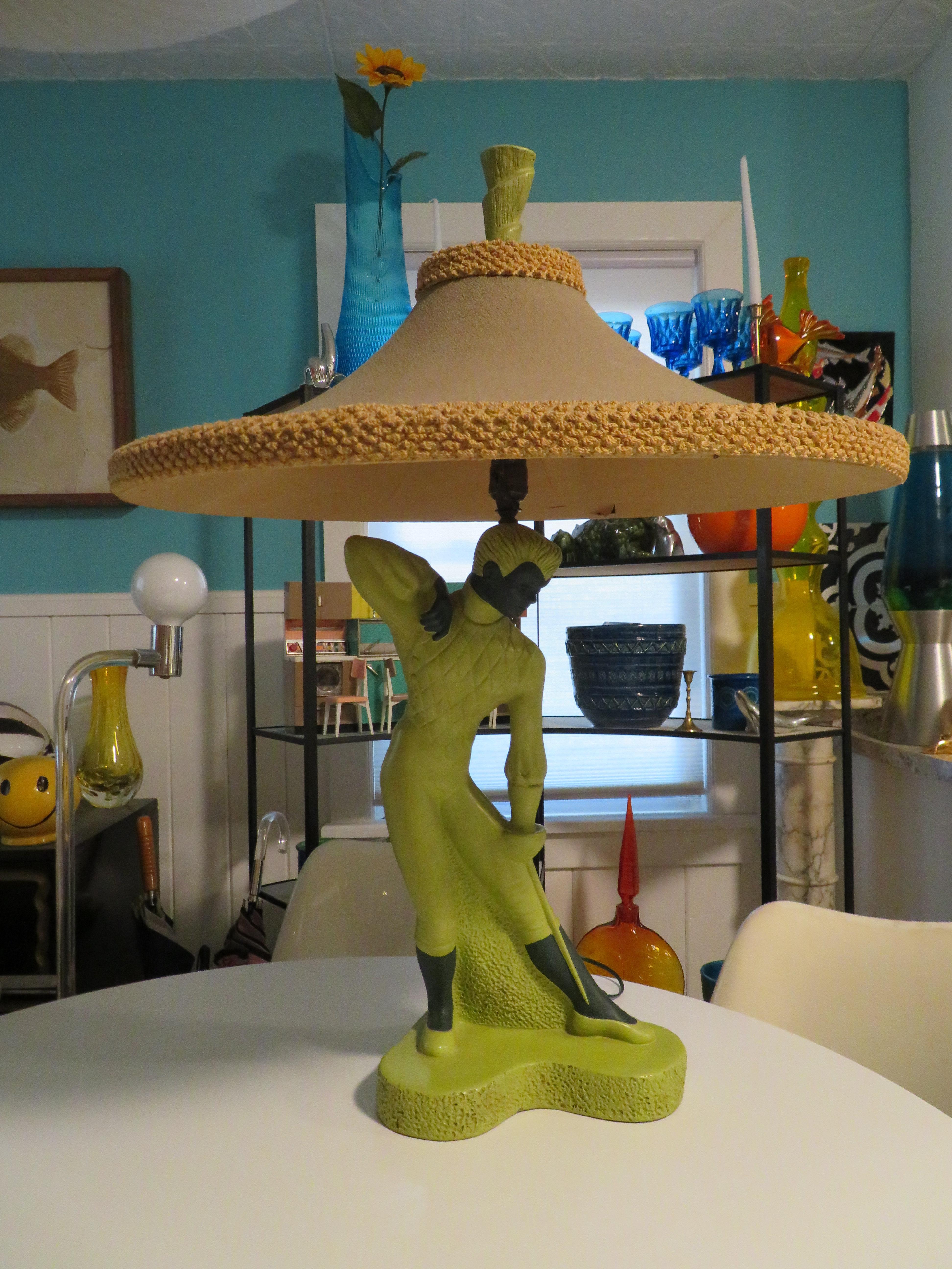 All original vintage rare Reglor of California lamp, featuring a gorgeous lime green/ brown male fencer. Signed Reglor of California and is dated 1951 and includes an original Reglor shade. The lamp shade will need to be redone-original fabric is