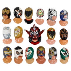 Fantastique ensemble de 18 têtes de guerriers mexicains luttants vintage