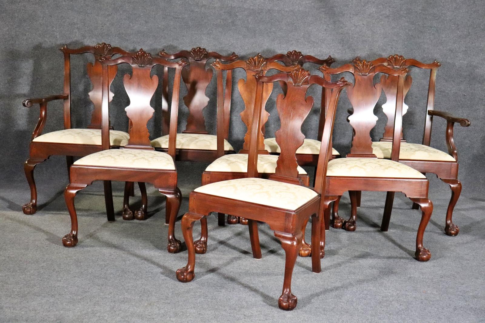 Wood frames. Ball and claw feet. Carved. Upholstered. 2 arm chairs measure 40 1/8