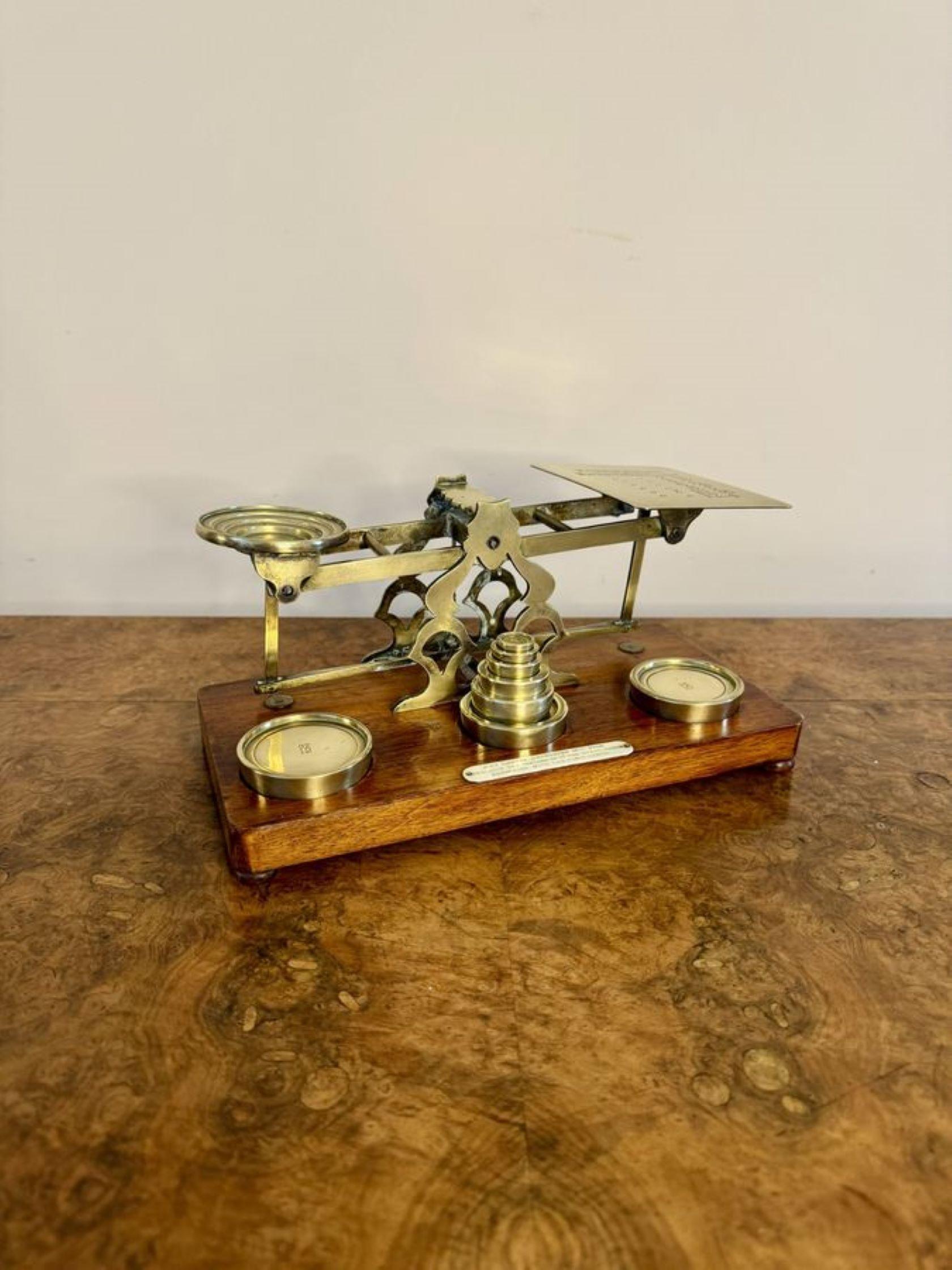 Fantastic set of large antique Victorian postal scales and weights by S.Mordan London, having a fantastic quality set of antique Victorian scales by S.Mordan London, the brass scales mounted on a rectangular shaped base raised on four bun feet with