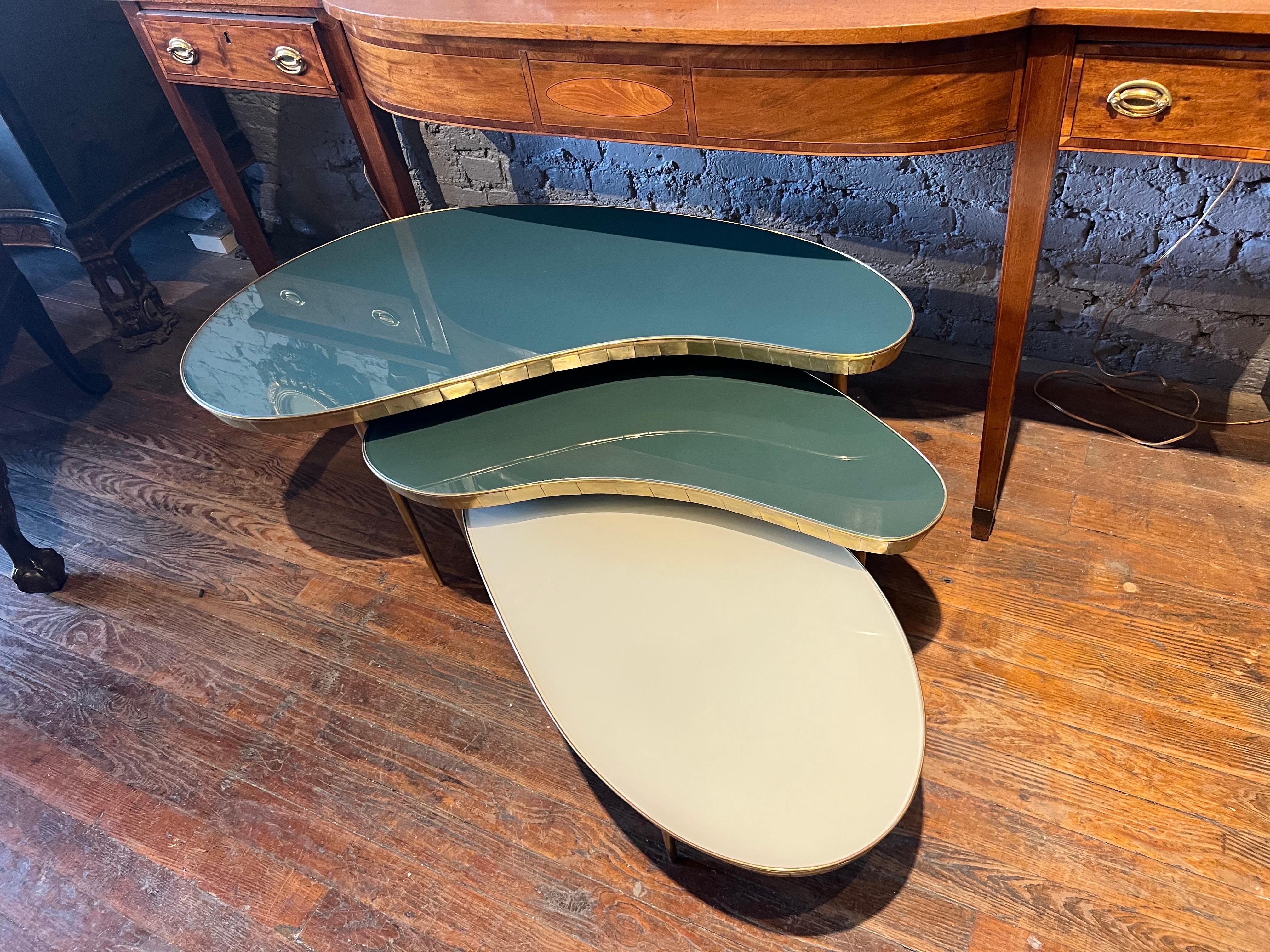 Chic set of three mid-century Italian “nesting” coffee tables. Each table made to tuck under the next one or be used separately as side tables. Very fine quality. 


Smallest 30.75 x 17.5 x 12.5 H.