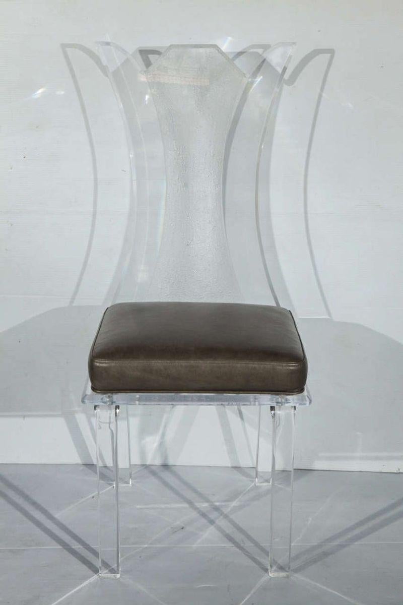 Fantastic set of 6 lucite chairs.