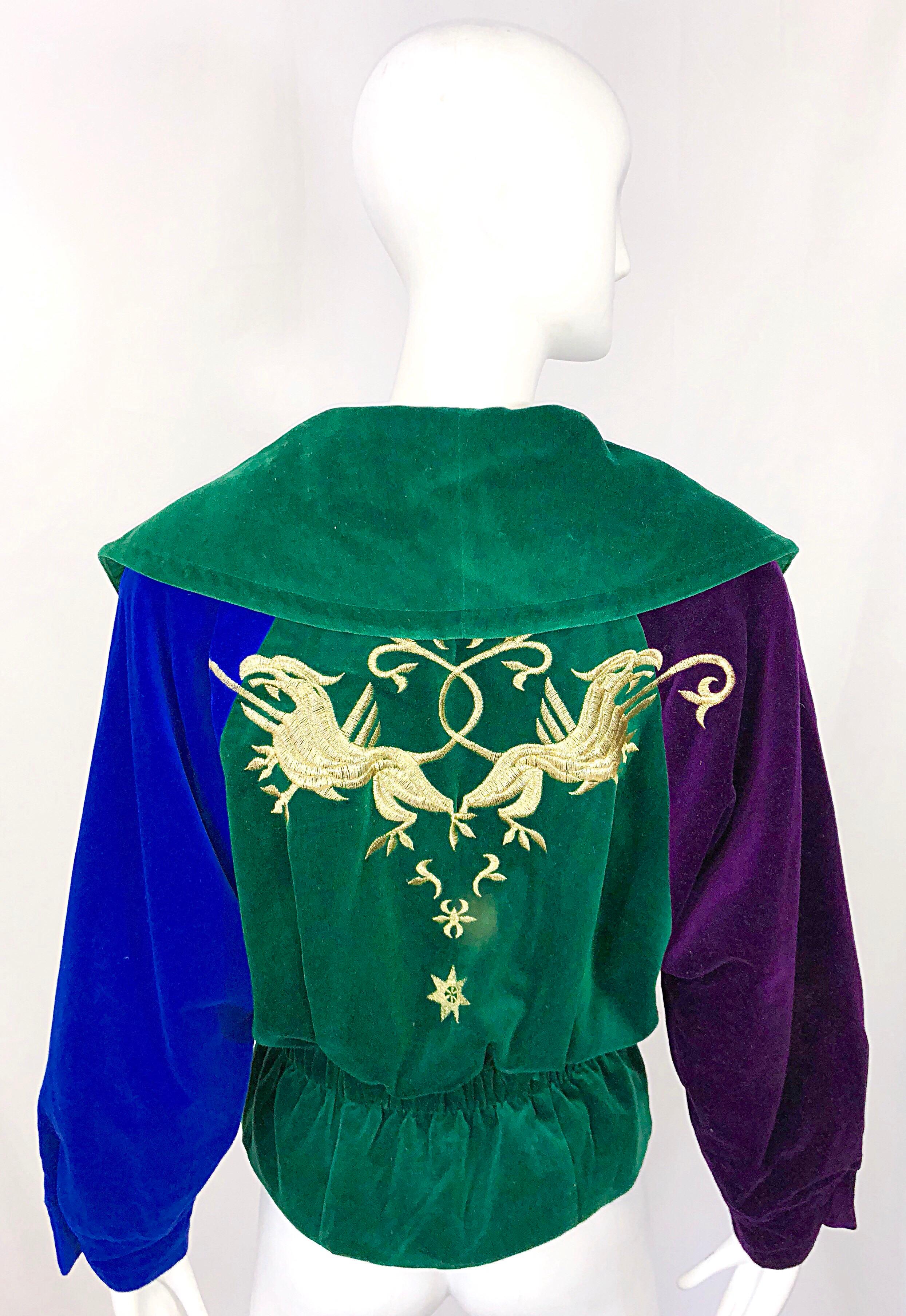 Stylish vintage LAUREL for ESCADA 1980s Avant Garde velvet cotton bomber jacket! Features panels of hunter green, royal blue and purple, with gold embroidery throughout. Double breasted style. Perfect for Mardi Gras ! Fully lined. Elastic waistband