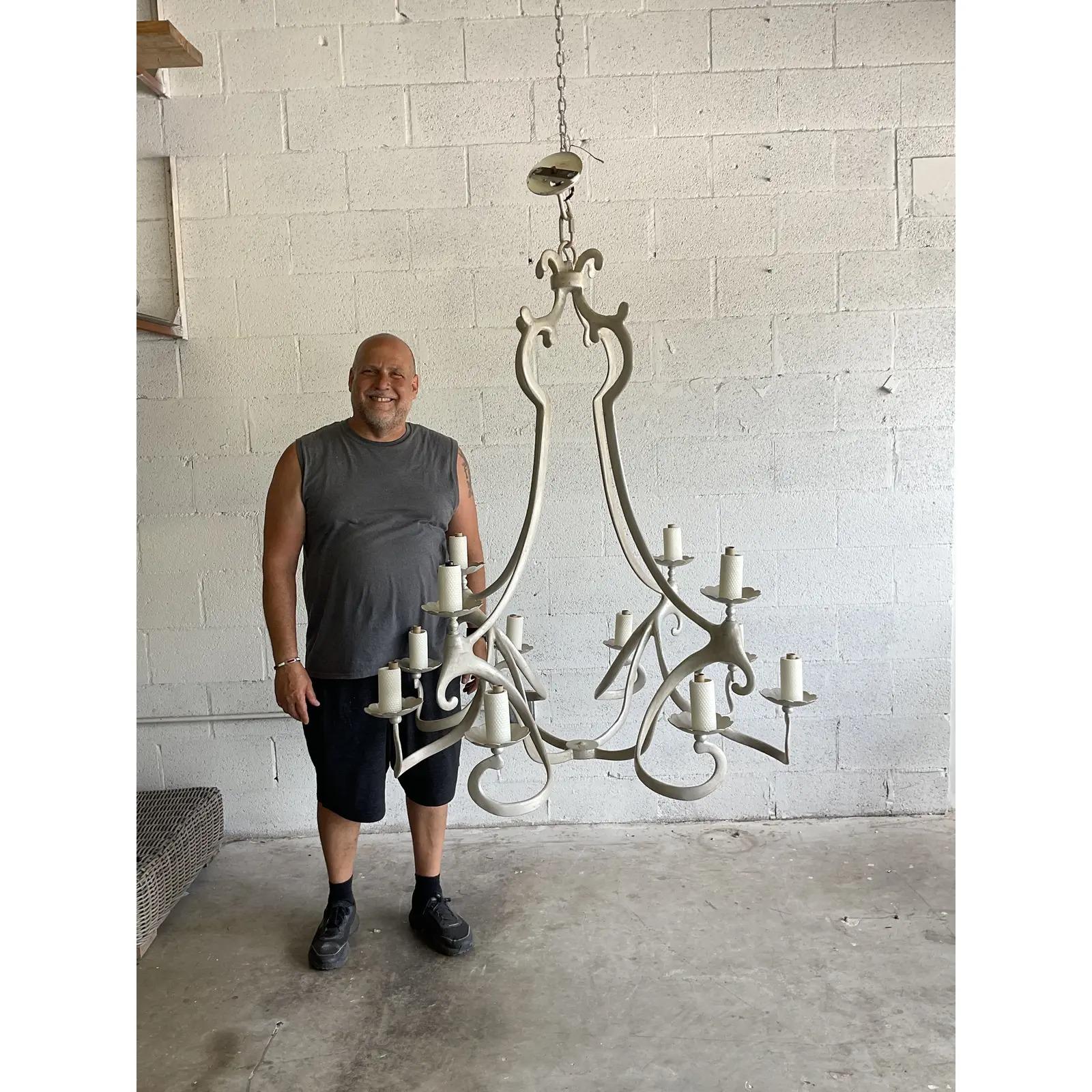 Fantastic vintage Contemporary chandelier. Beautiful and unusual biomorphic shape. A matte finish In a pale grey. Acquired from a Palm Beach estate.