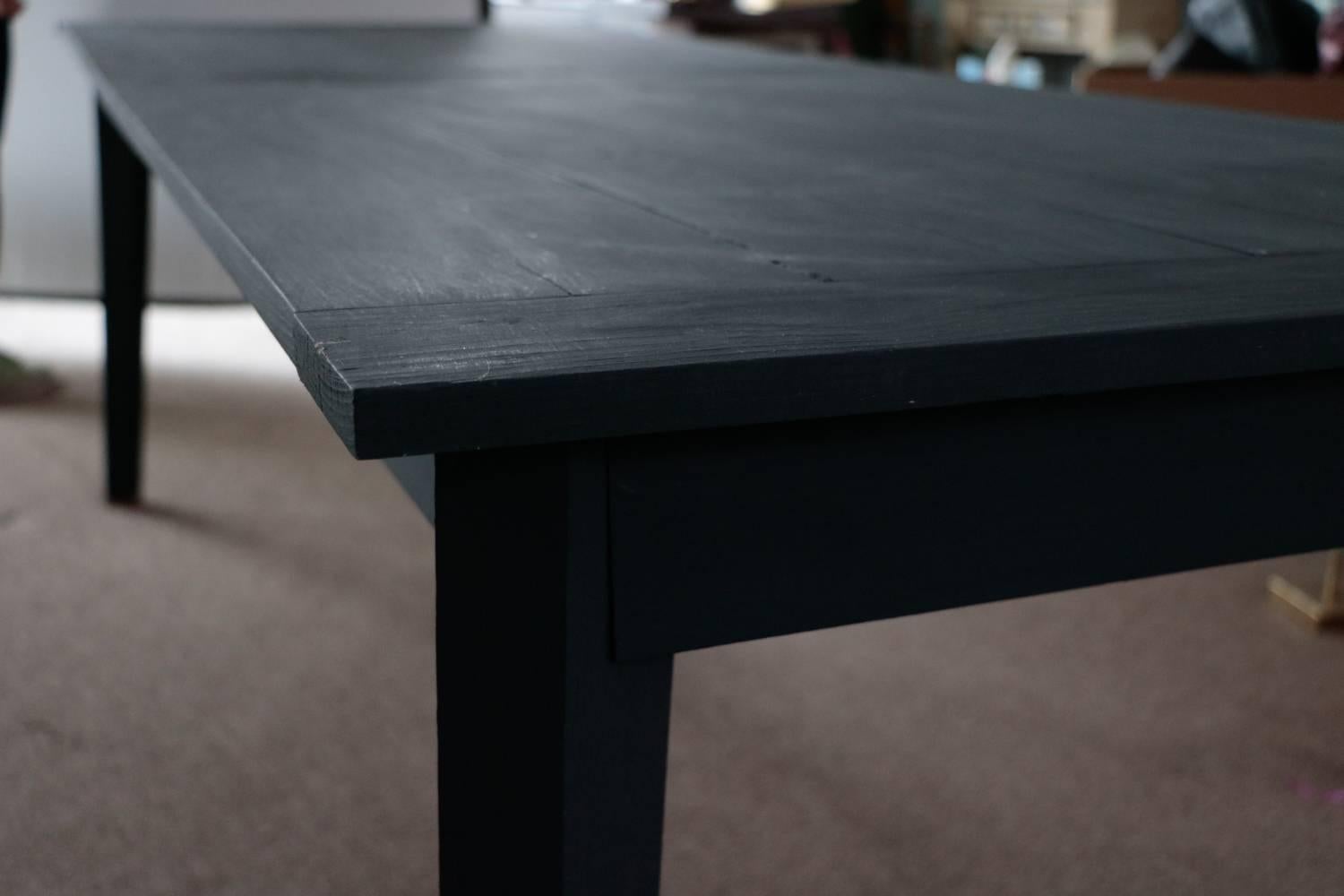 Fantastic, fun, large, slim and sleek- (just how we like 'em) organically custom-made - Organically painted space black farm table. Sits 8-12. Lots of character! This piece will sit 8-12 of your own character's. Great for kid friendly organic